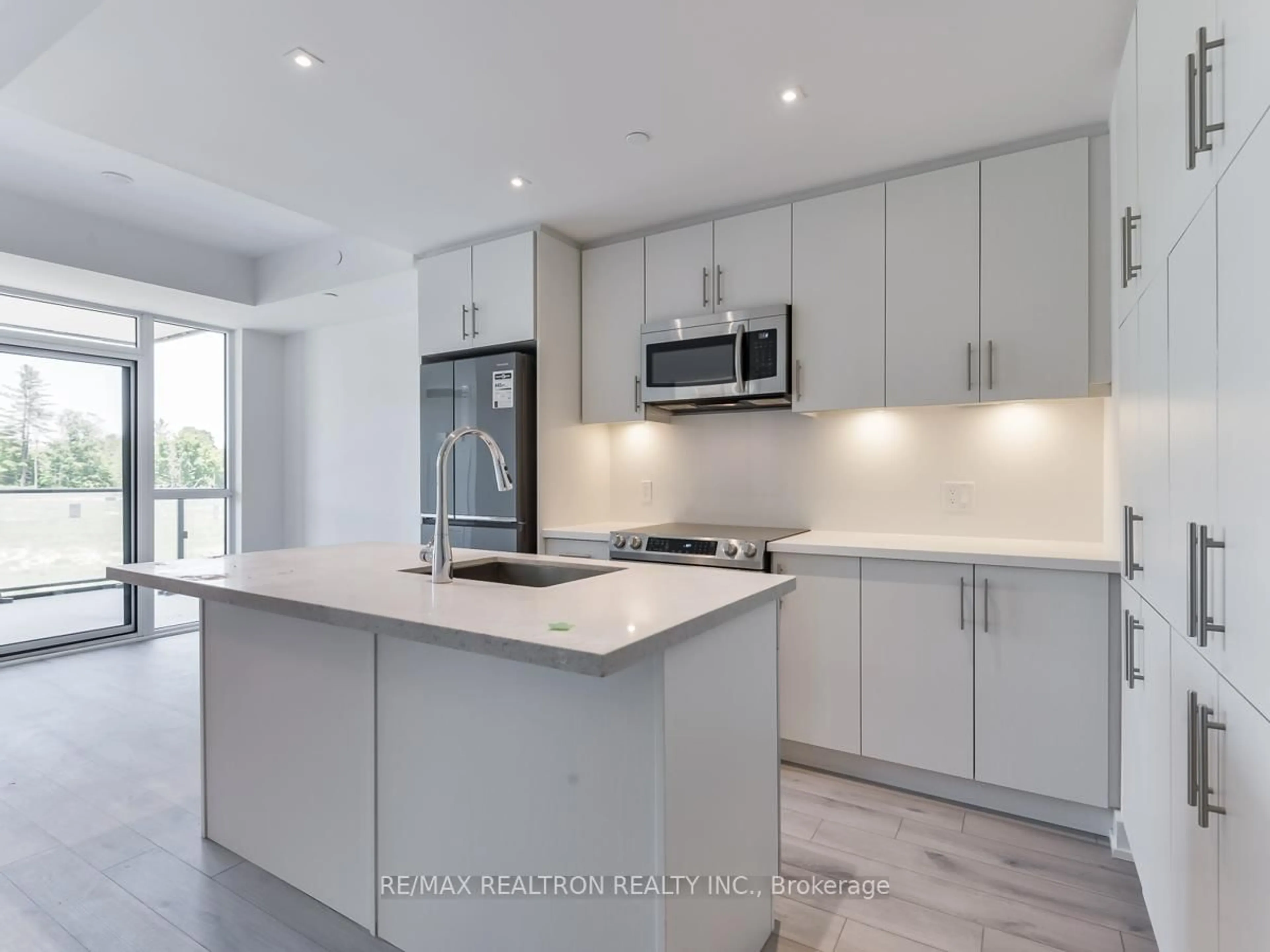 Open concept kitchen, unknown for 375 Sea Ray Ave #209, Innisfil Ontario L9S 2P7