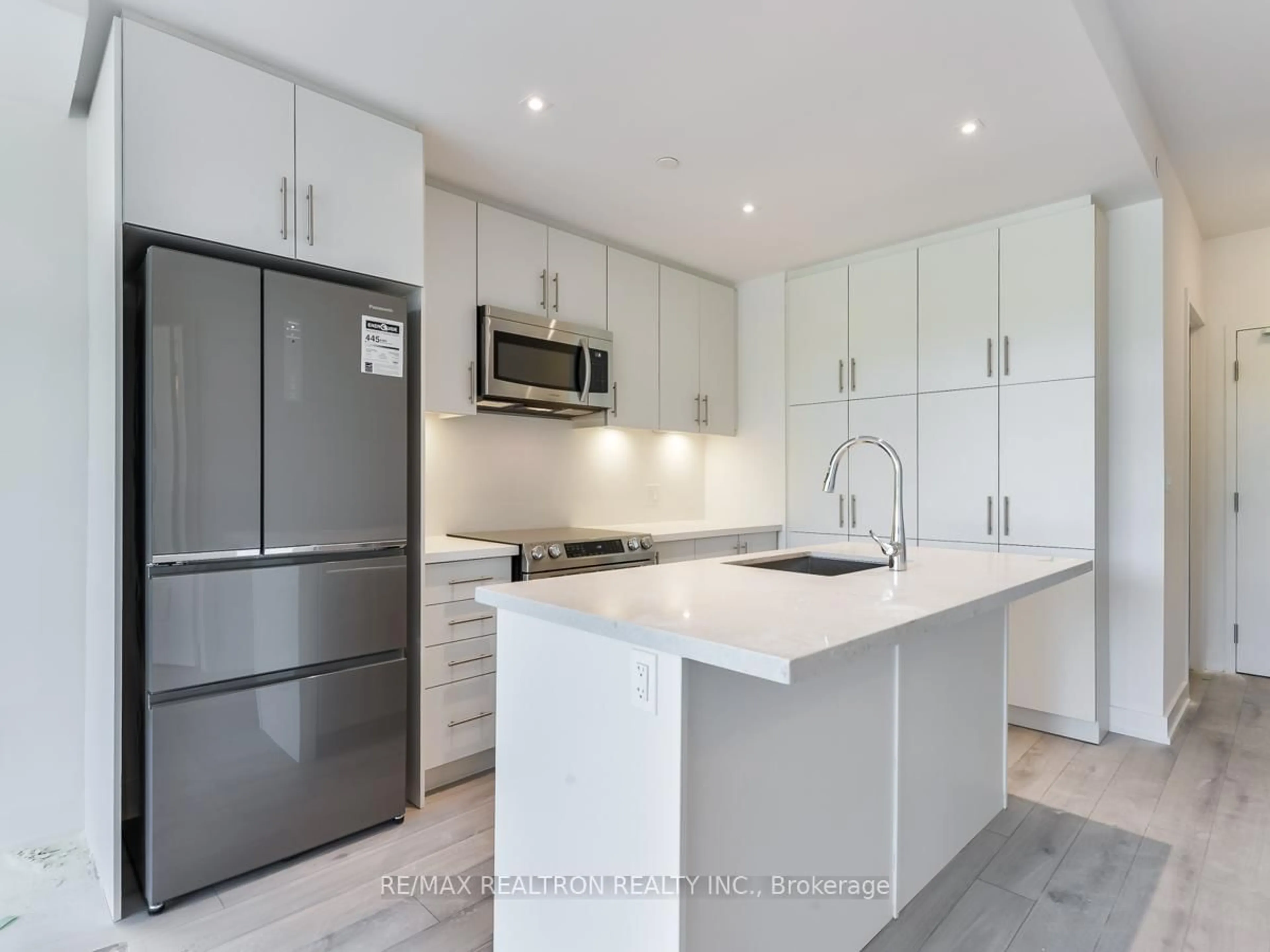 Open concept kitchen, ceramic/tile floor for 375 Sea Ray Ave #209, Innisfil Ontario L9S 2P7