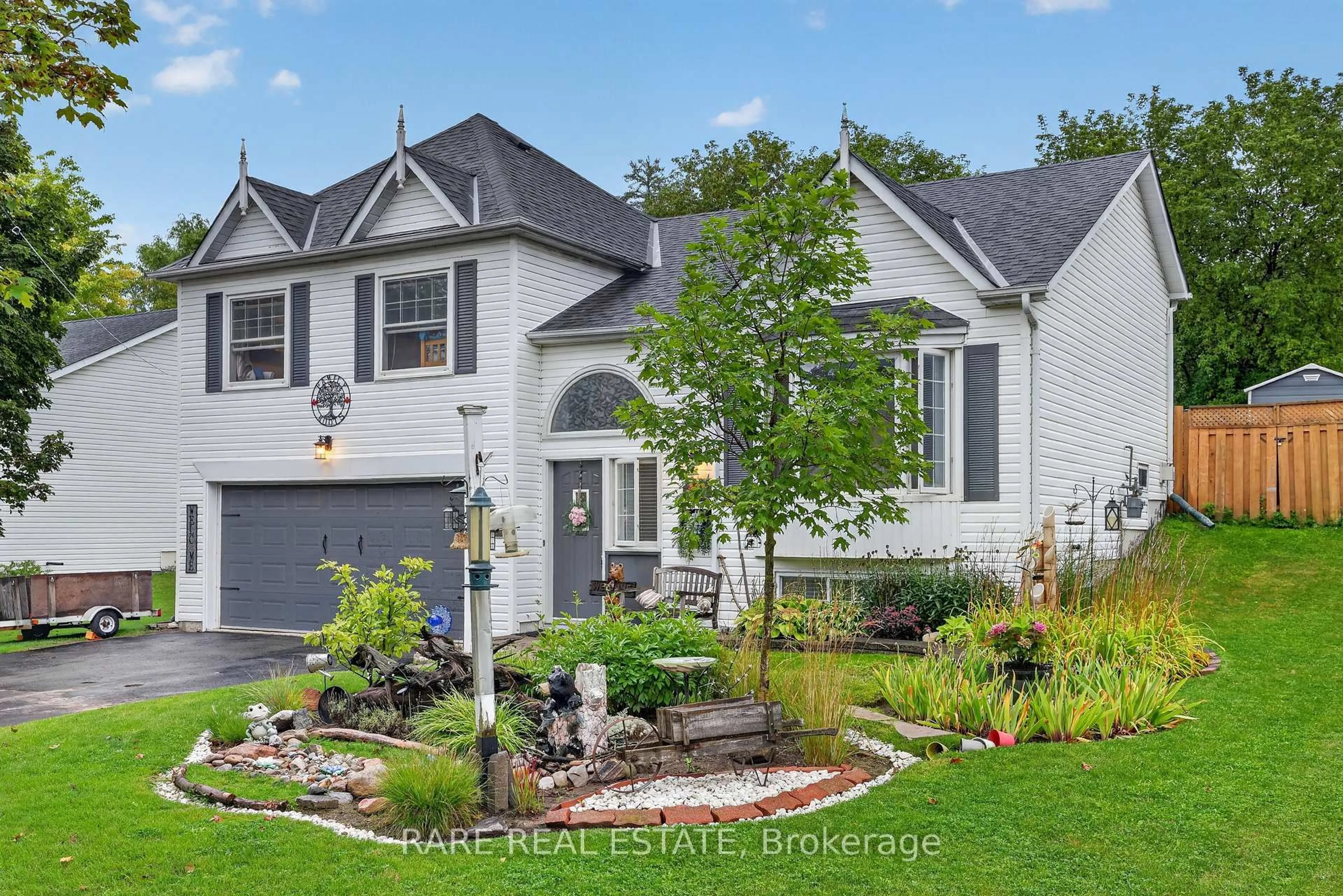 Home with vinyl exterior material, street for 42 Michael St, Essa Ontario L0M 1B5