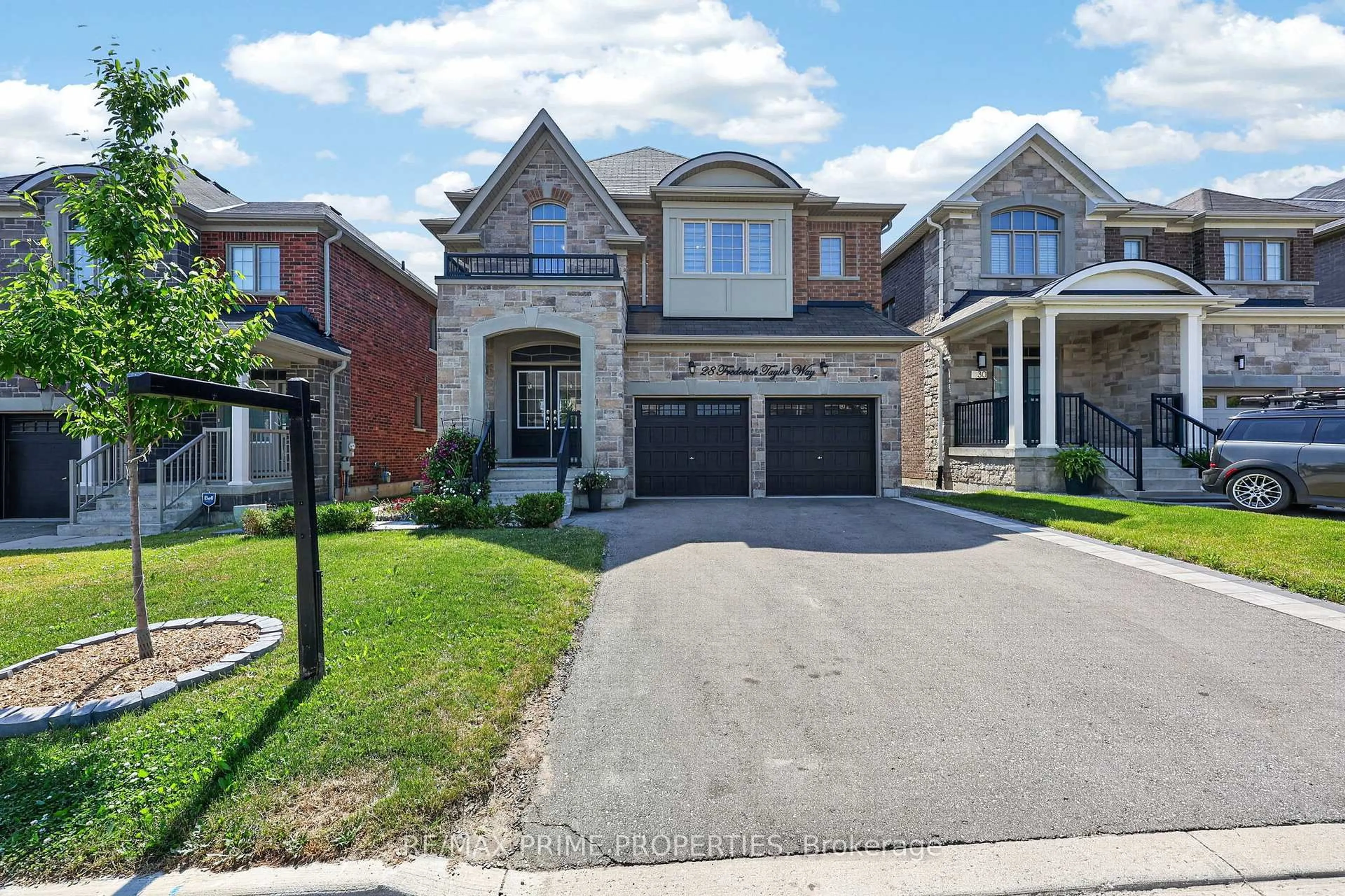 Home with brick exterior material, street for 28 Frederick Taylor Way, East Gwillimbury Ontario L0G 1M0