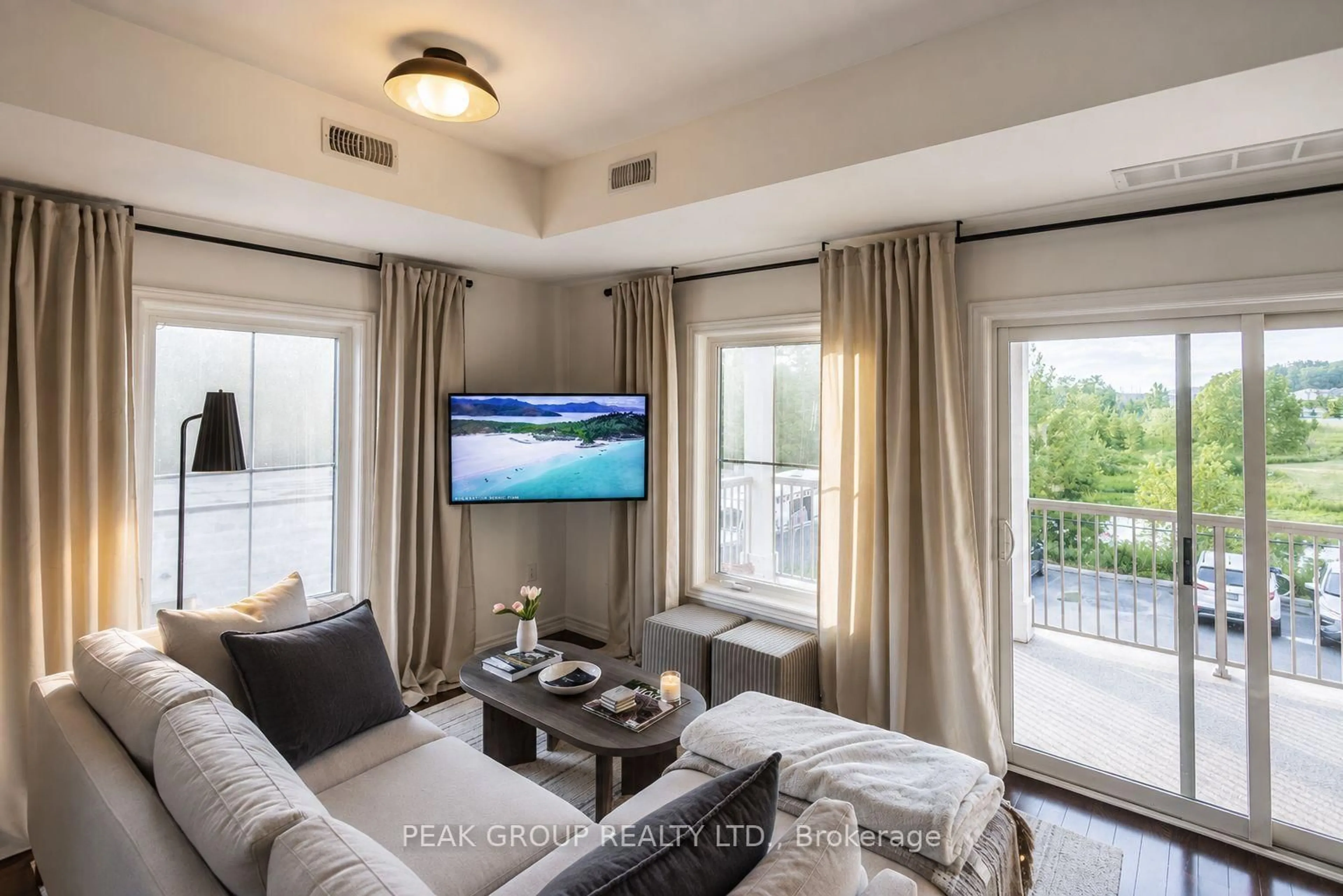 Living room with furniture, unknown for 6884 14th Ave #2A, Markham Ontario L6B 1A8