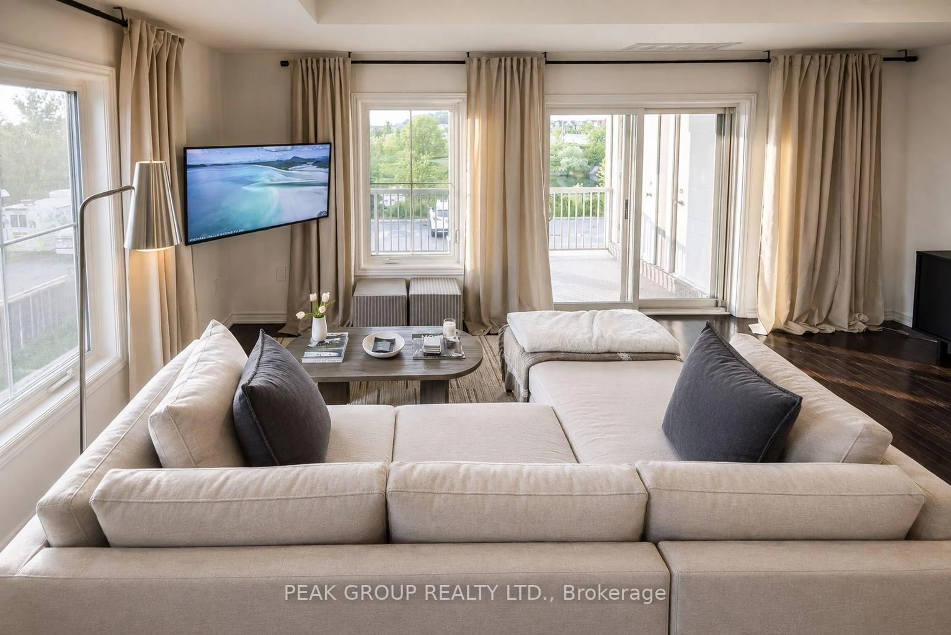 Living room with furniture, unknown for 6884 14th Ave #2A, Markham Ontario L6B 1A8