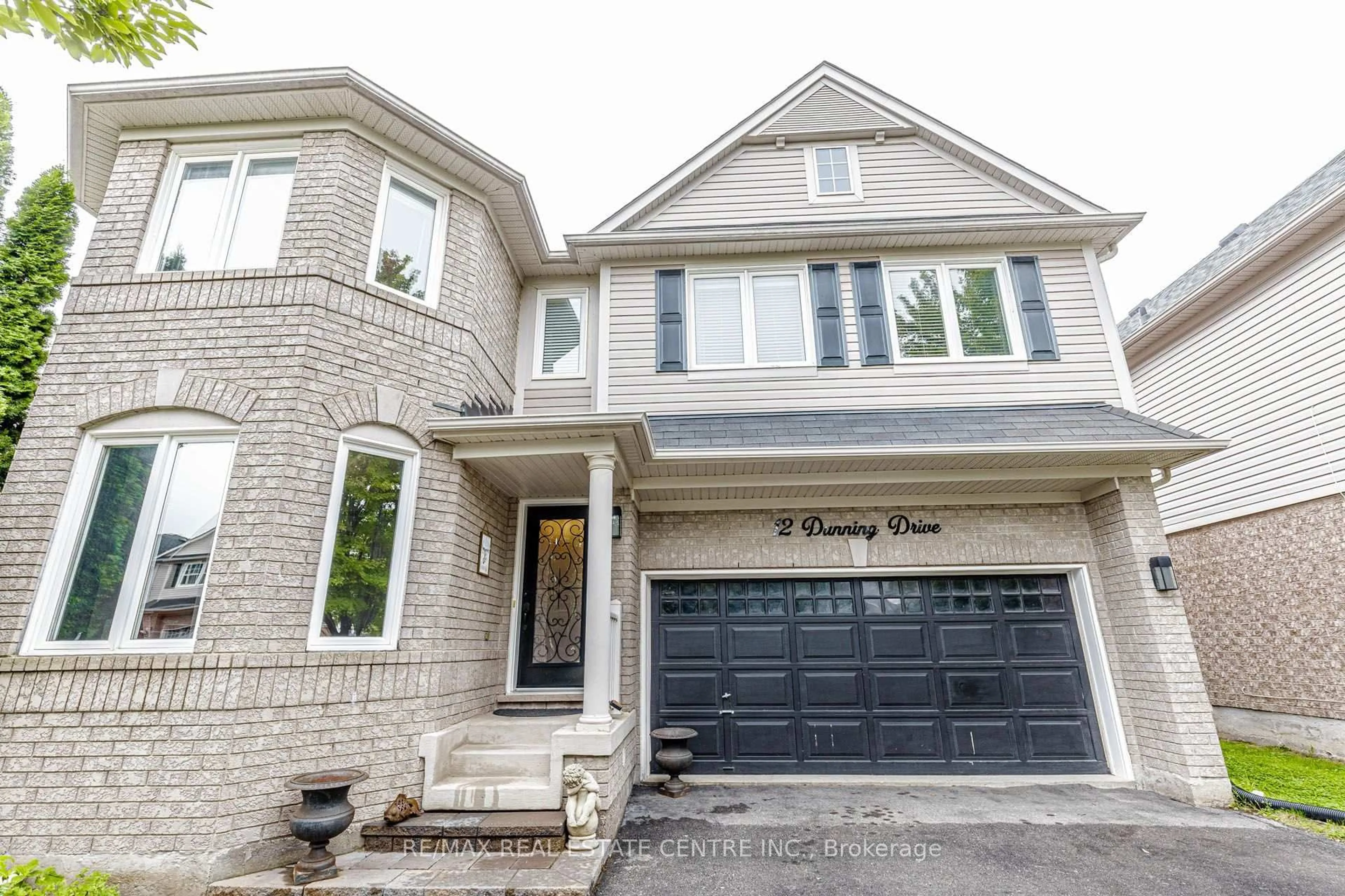 Home with brick exterior material, street for 12 Dunning Dr, New Tecumseth Ontario L9R 0B5