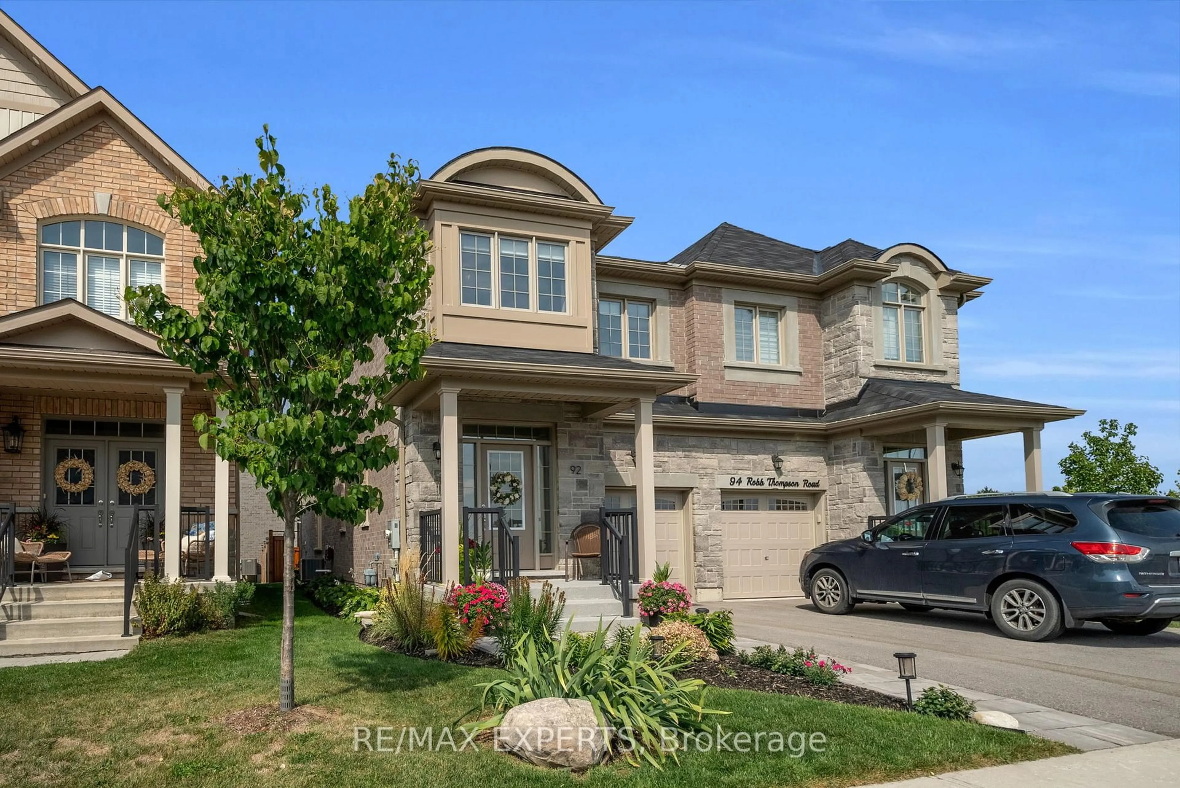 Home with brick exterior material, street for 92 Robb Thompson Rd, East Gwillimbury Ontario L0G 1M0