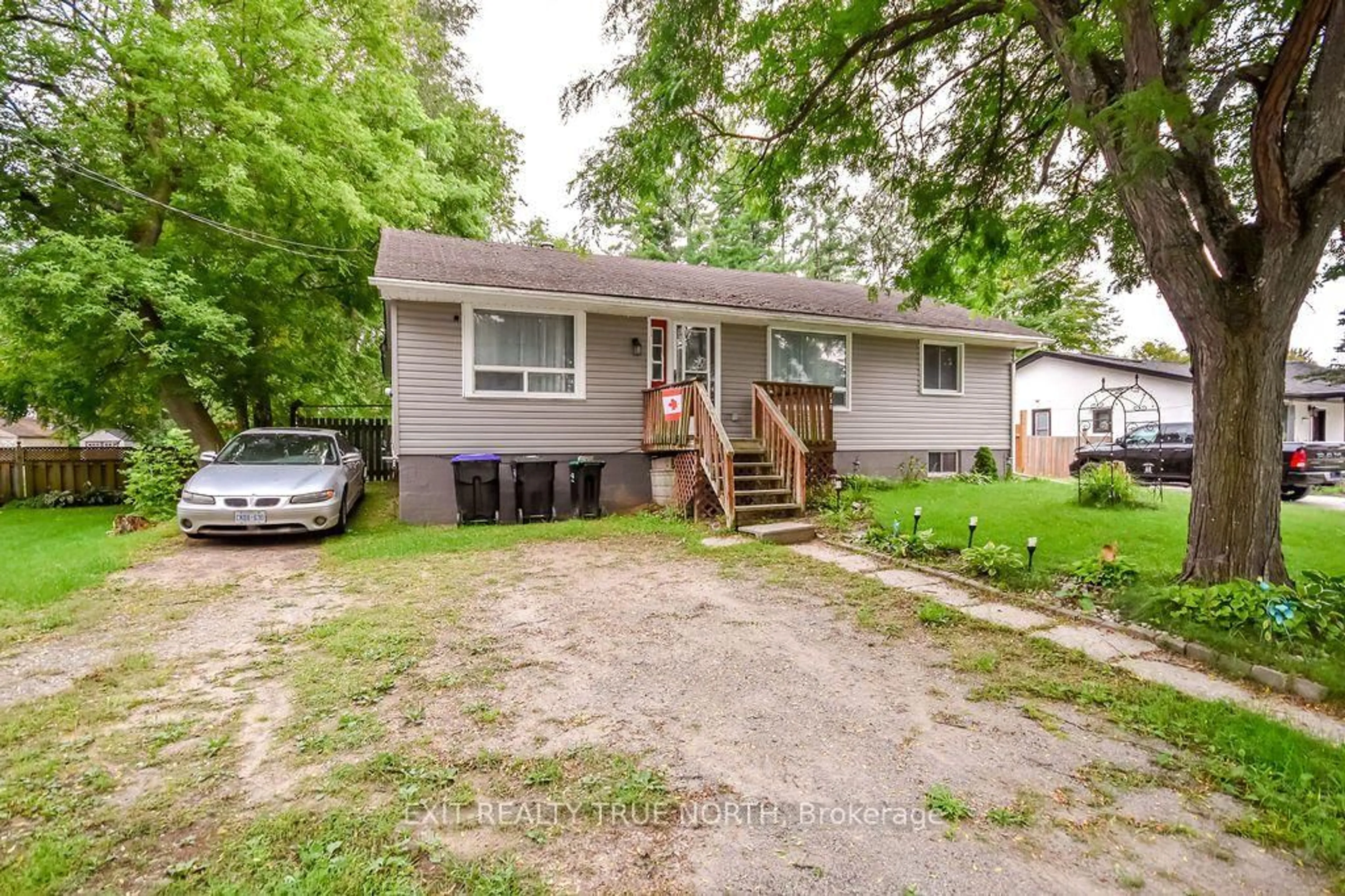 Home with vinyl exterior material, street for 130 Sydenham St, Essa Ontario L0M 1B0