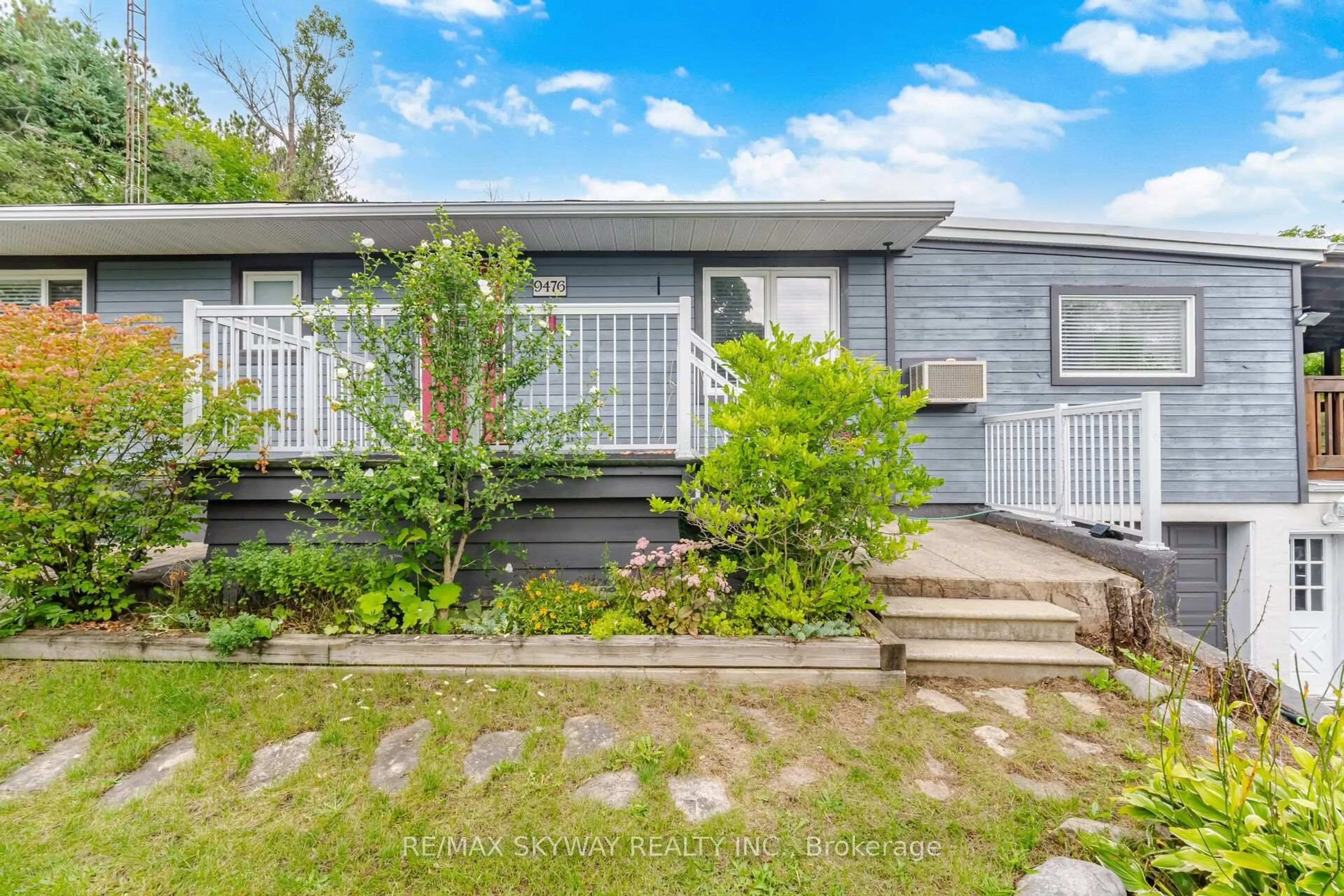 Home with vinyl exterior material, street for 9476 Highway 9, Adjala-Tosorontio Ontario L0G 1W0