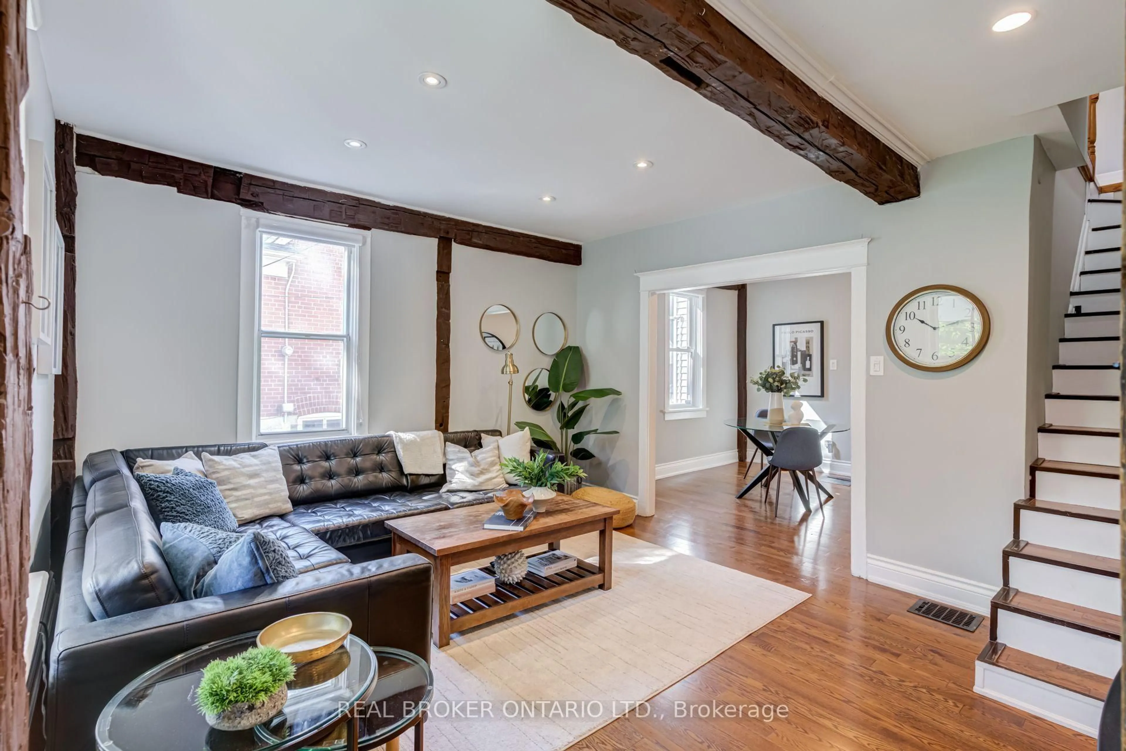 Living room with furniture, wood/laminate floor for 30 Elizabeth St, Richmond Hill Ontario L4C 3V4