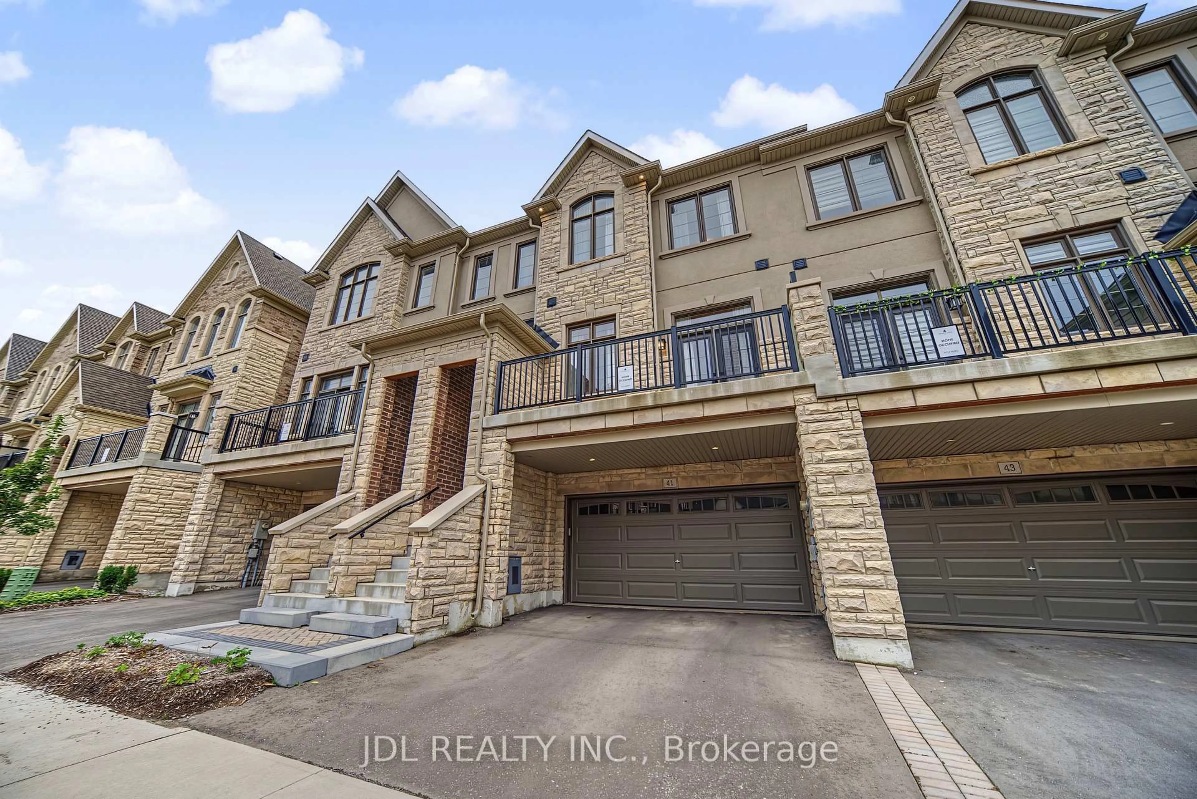 Home with brick exterior material, street for 41 West Village Lane, Markham Ontario L6C 3L5