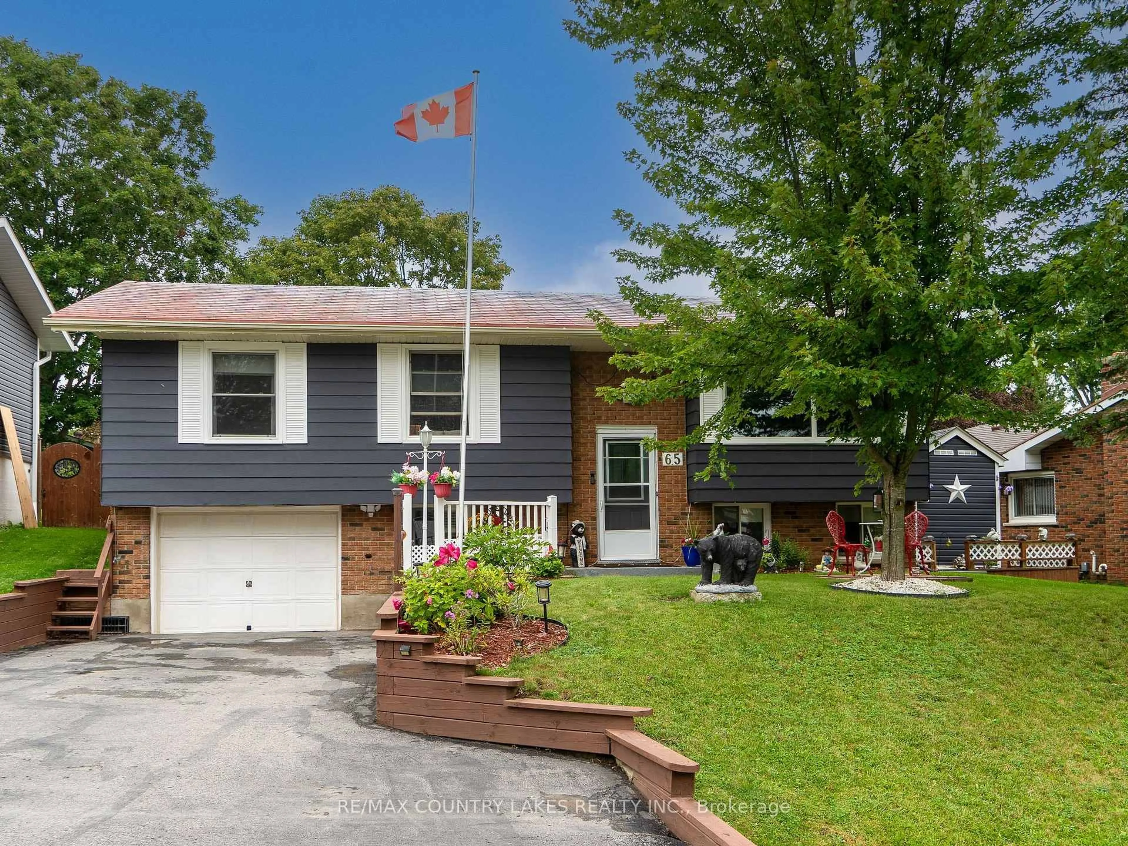 Home with vinyl exterior material, street for 65 Beaver Ridge Dr, Brock Ontario L0E 1E0