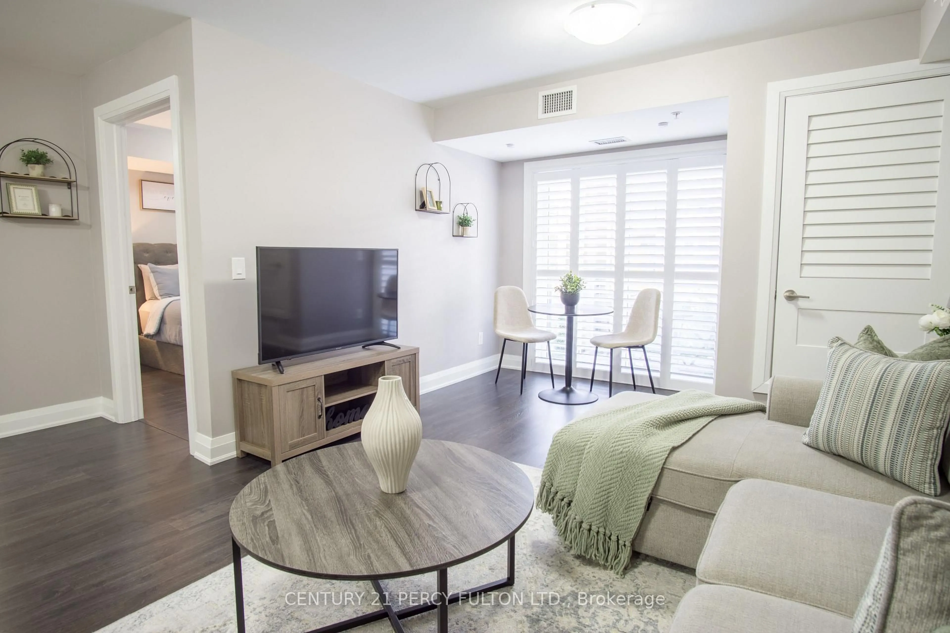 Living room with furniture, unknown for 481 Rupert Ave #201, Whitchurch-Stouffville Ontario L4A 1Y7