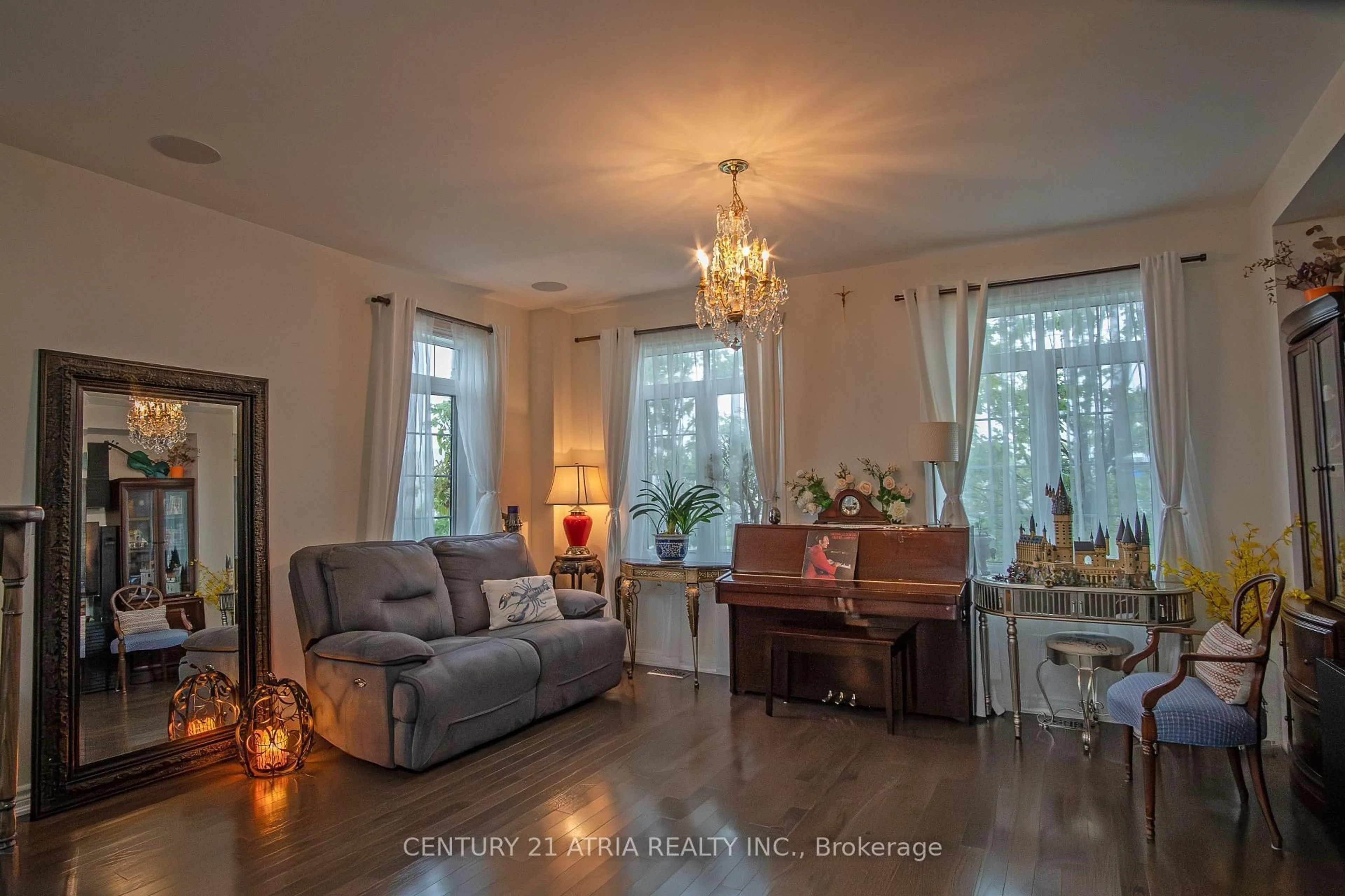 Living room with furniture, wood/laminate floor for 10951 Woodbine Ave, Markham Ontario L6C 0X4