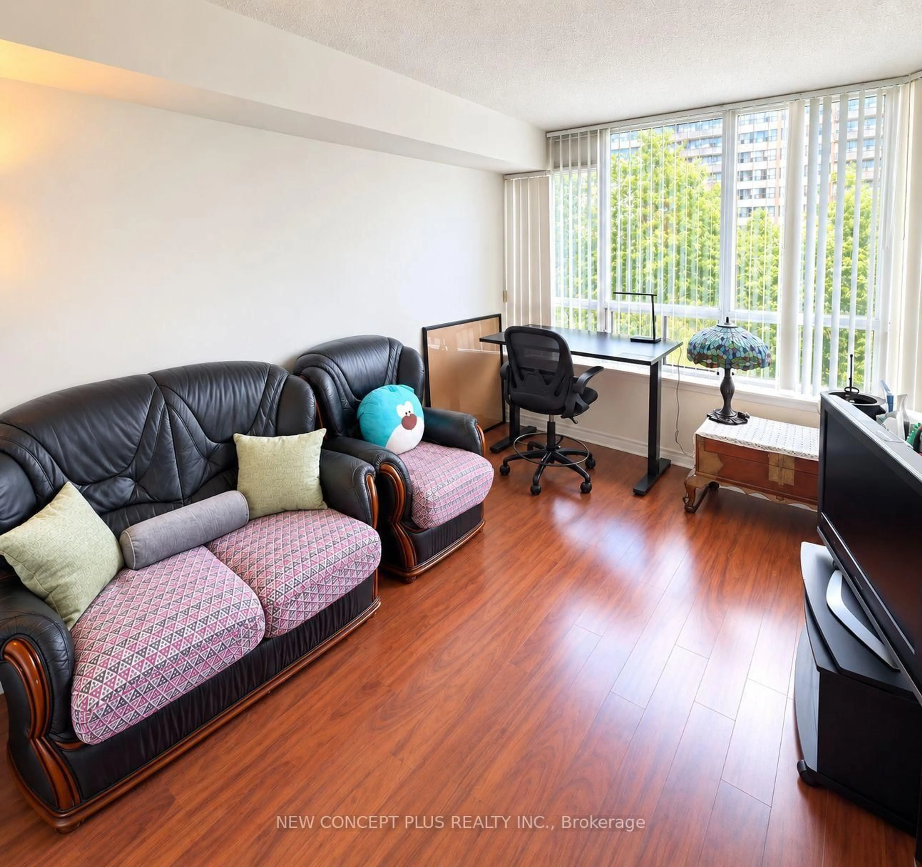 Living room with furniture, wood/laminate floor for 91 Townsgate Dr #506, Vaughan Ontario L4J 8E8