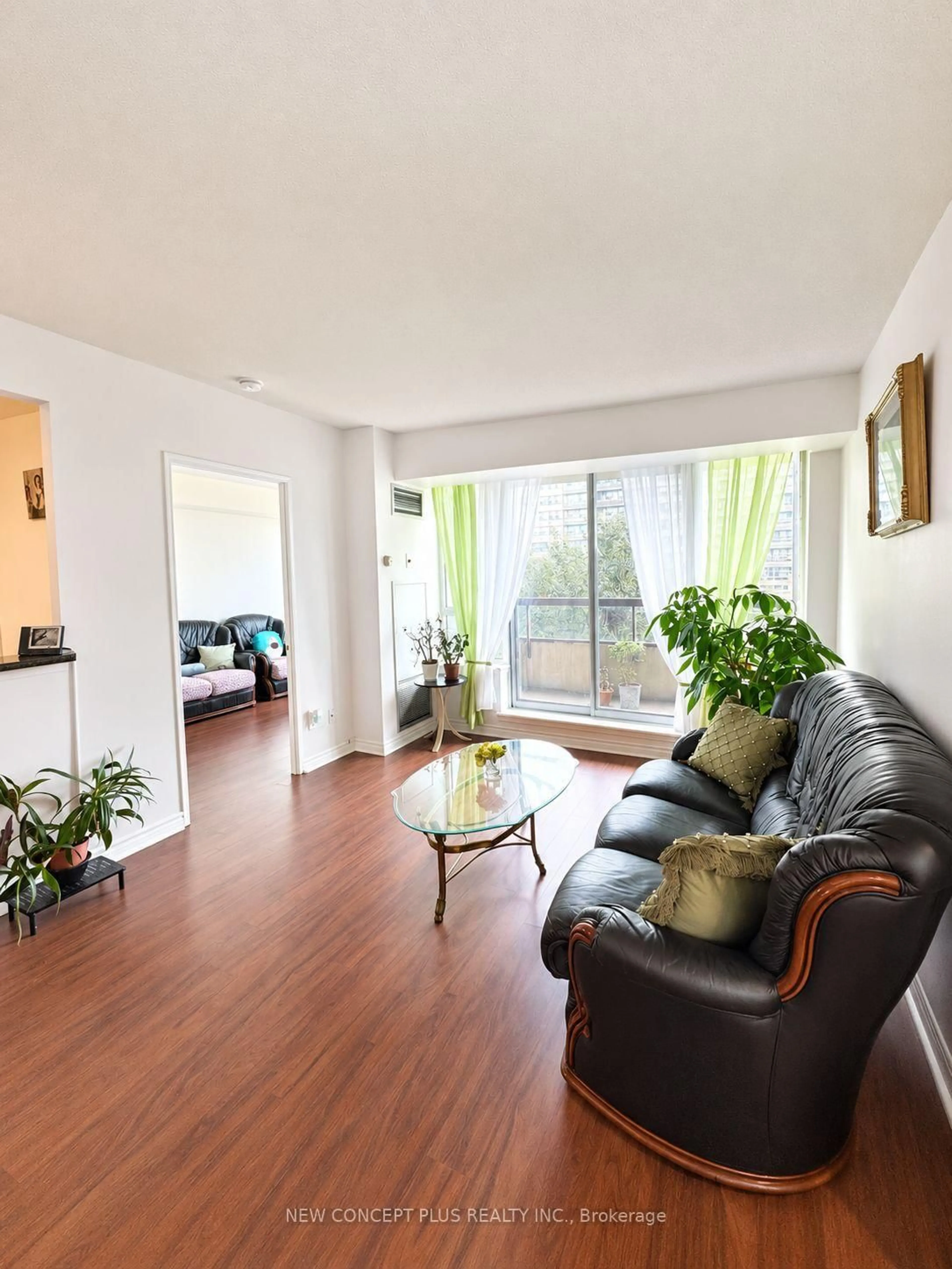 Living room with furniture, wood/laminate floor for 91 Townsgate Dr #506, Vaughan Ontario L4J 8E8