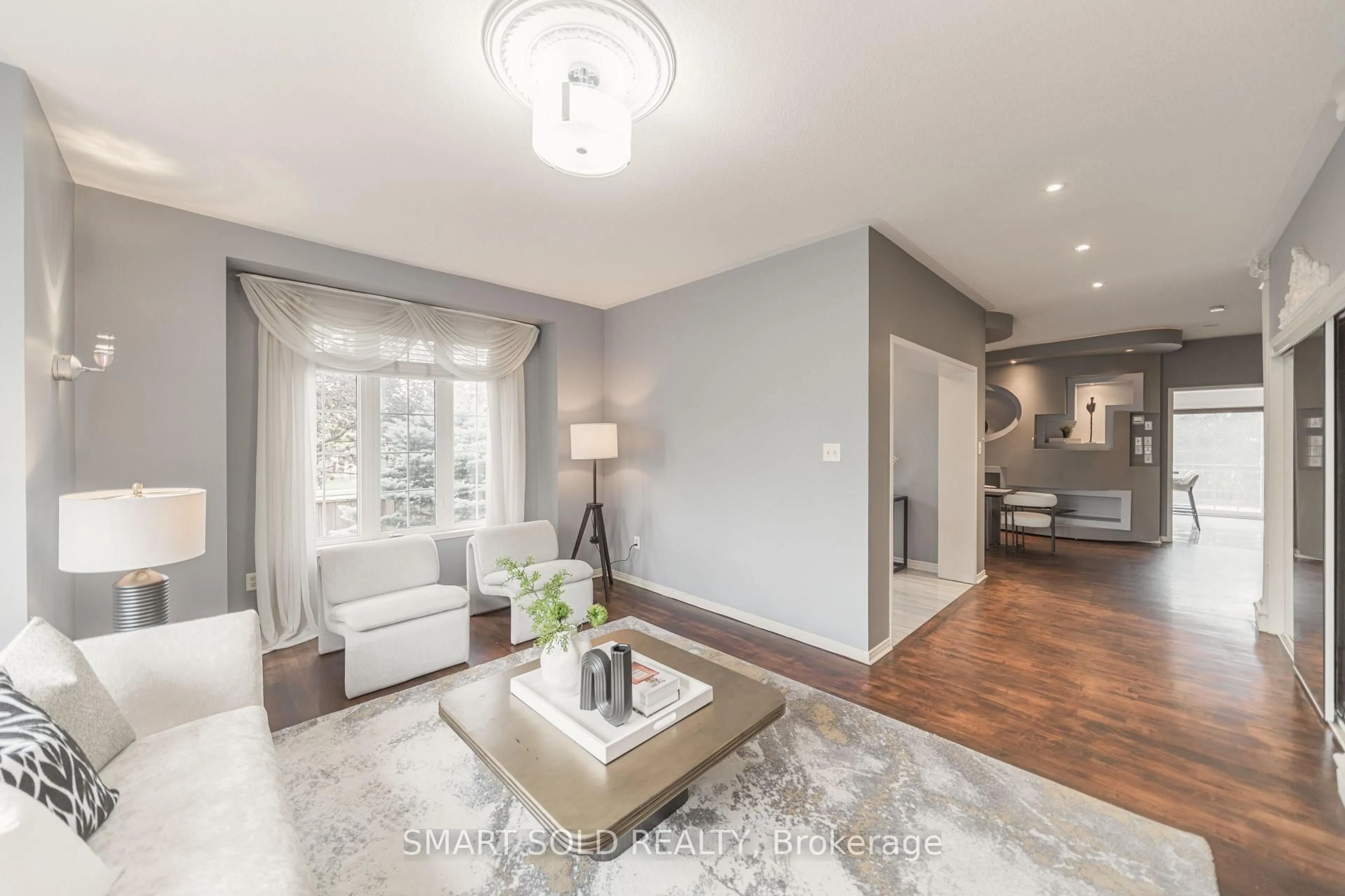 Living room with furniture, wood/laminate floor for 16 Courtney Cres, Richmond Hill Ontario L4E 4B9
