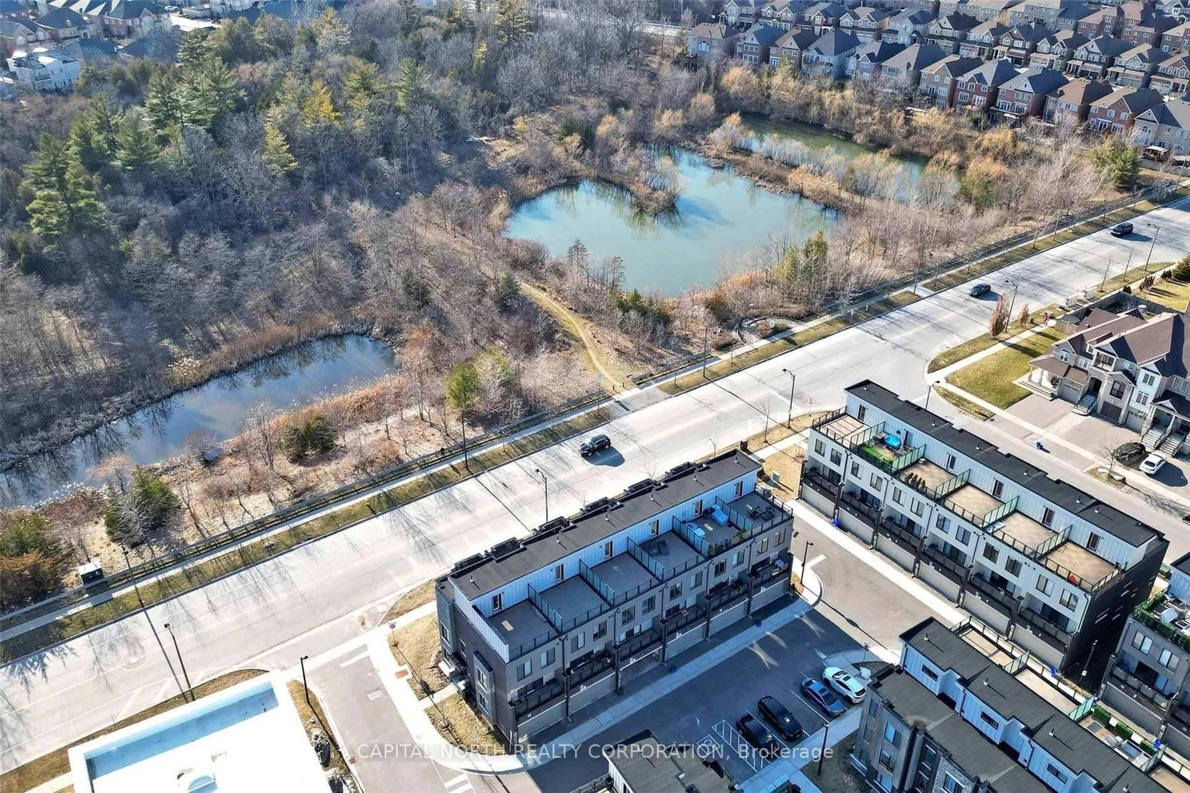 A pic from outside/outdoor area/front of a property/back of a property/a pic from drone, water/lake/river/ocean view for 65 Ilan Ramon Blvd, Vaughan Ontario L6A 5B5