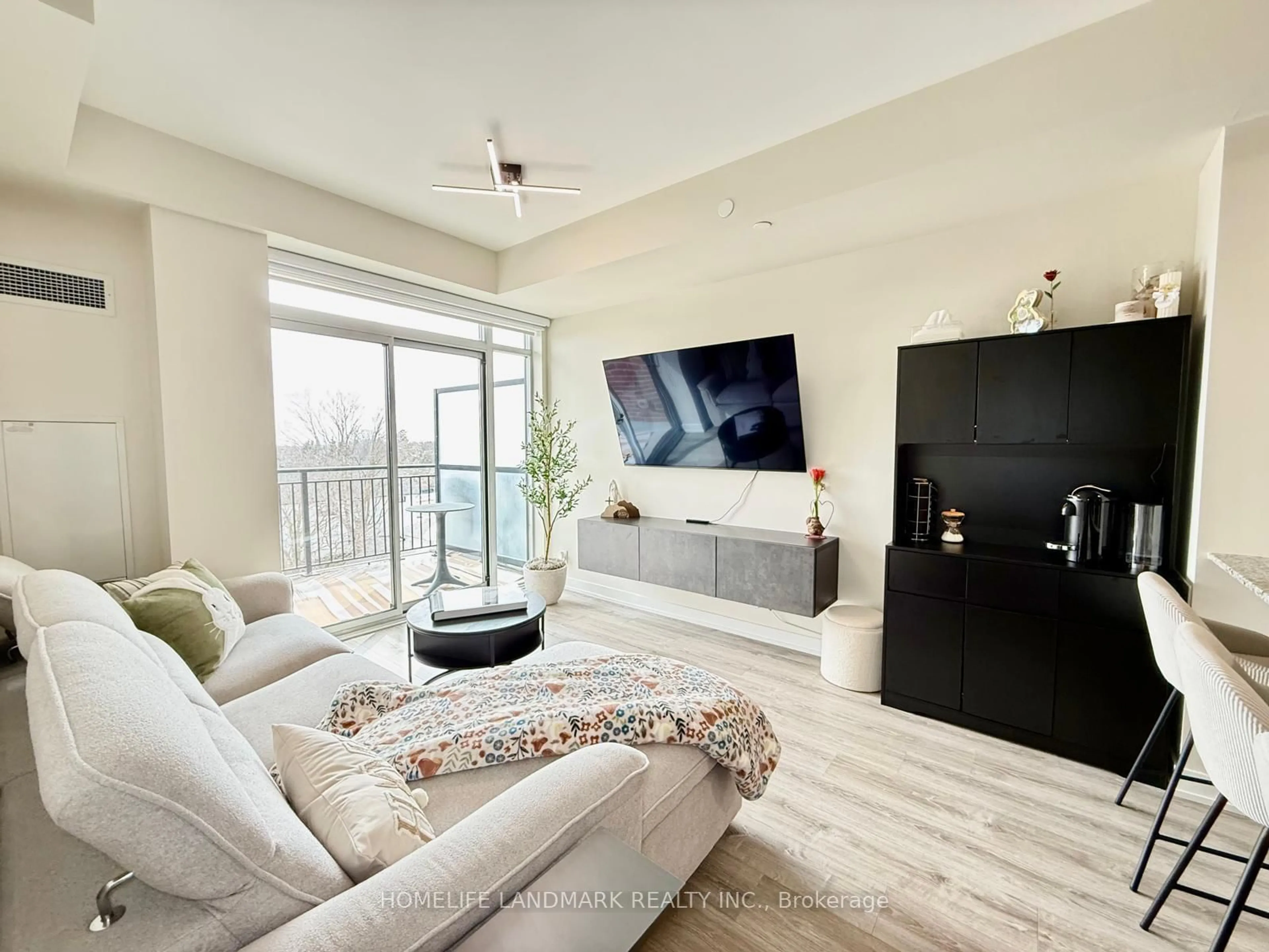 Living room with furniture, unknown for 6235 Main St #415, Whitchurch-Stouffville Ontario L4A 4J3