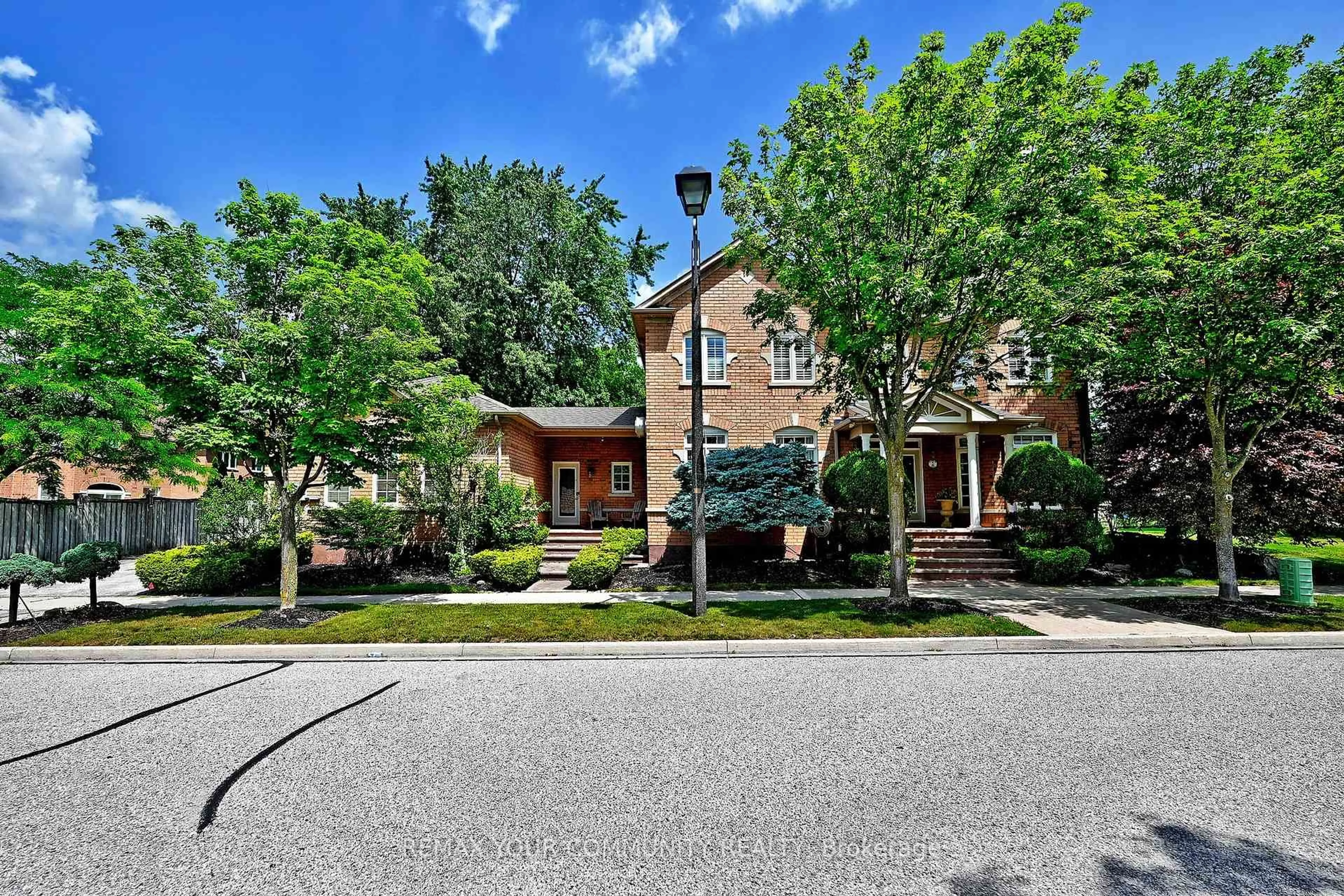 Home with brick exterior material, street for 2 Winterberry Dr, Markham Ontario L3S 4G3