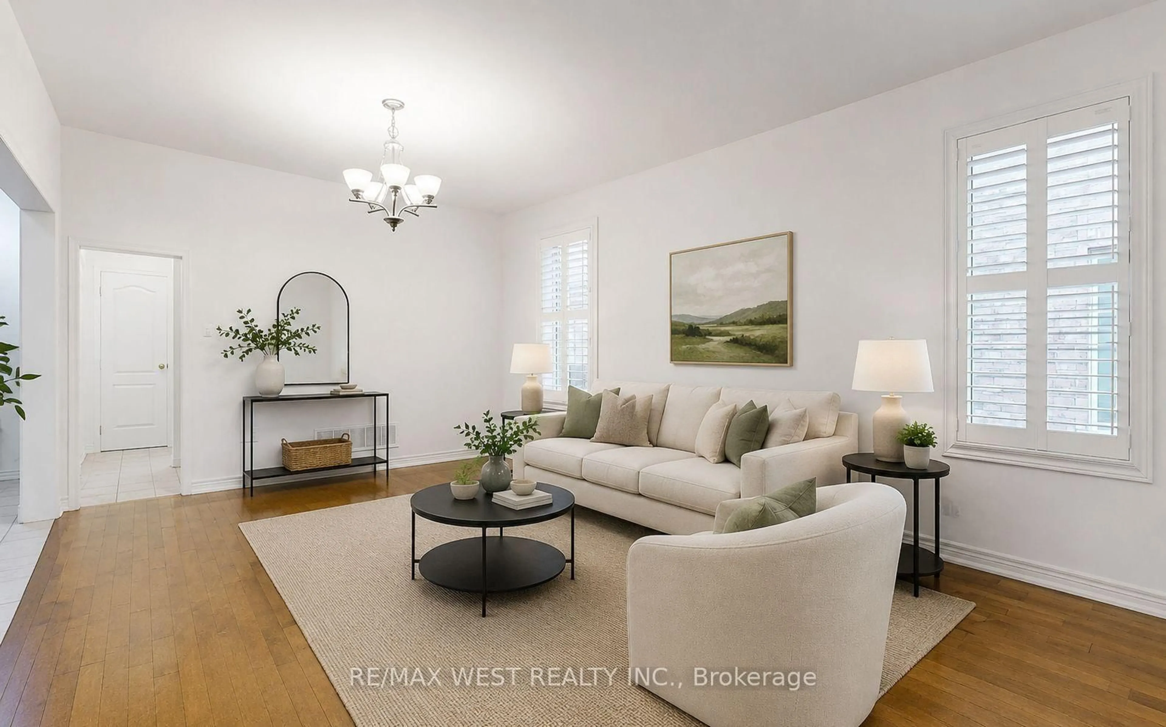Living room with furniture, wood/laminate floor for 73 Eakin Mill Rd, Markham Ontario L6E 1N9