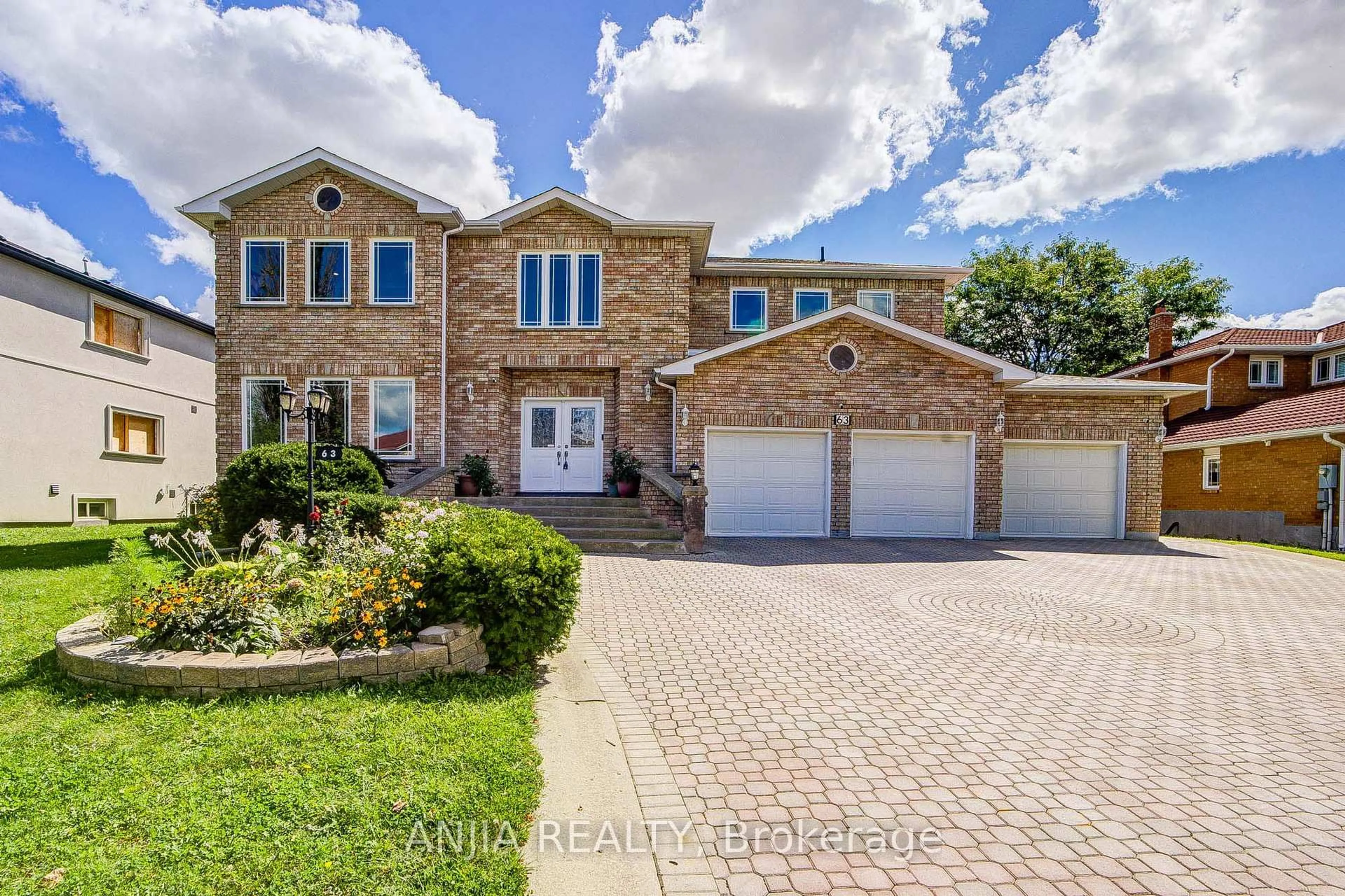 Home with brick exterior material, street for 63 Beckenridge Dr, Markham Ontario L3S 2V3