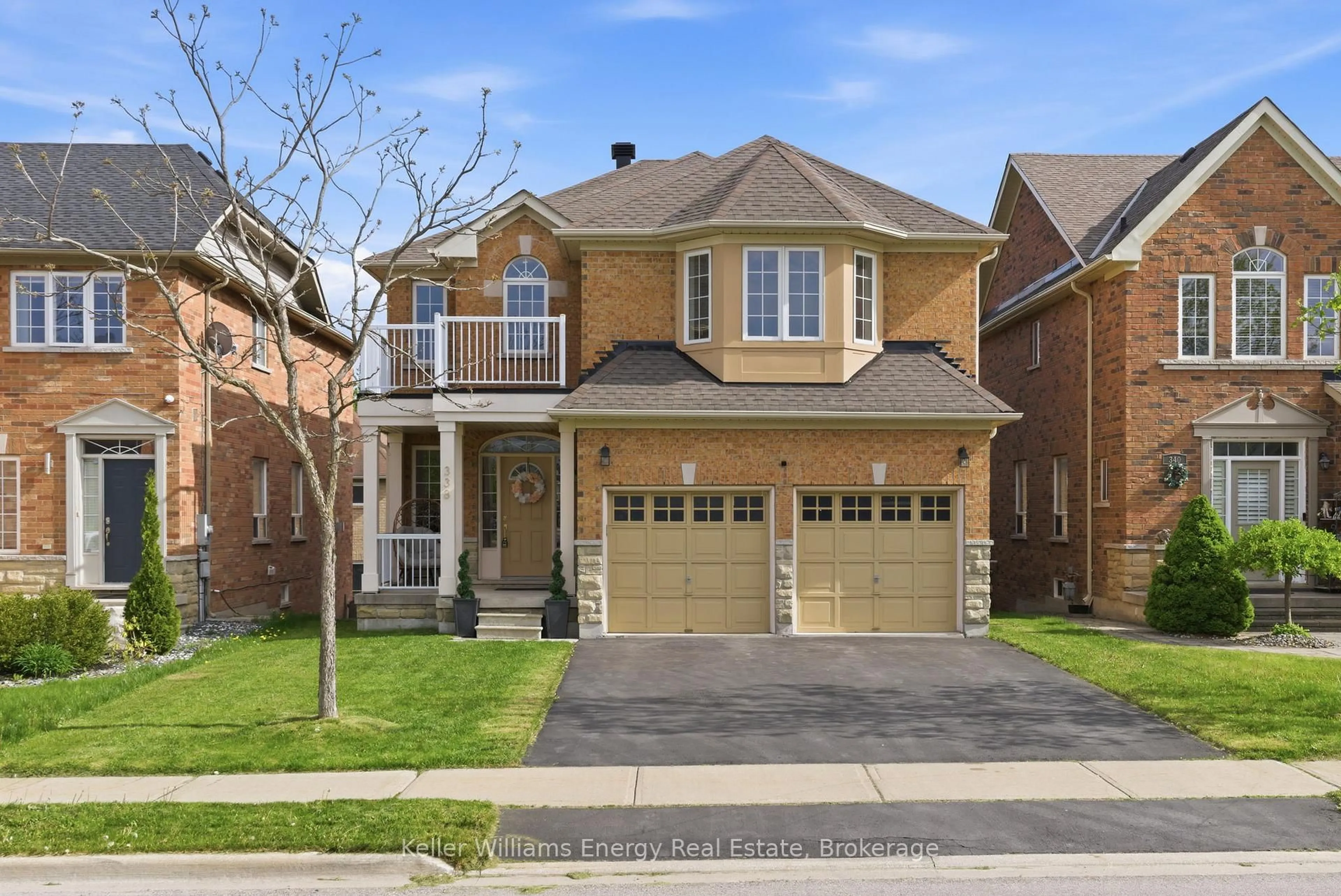 Home with brick exterior material, street for 338 Dowson Loop, Newmarket Ontario L3X 3G3