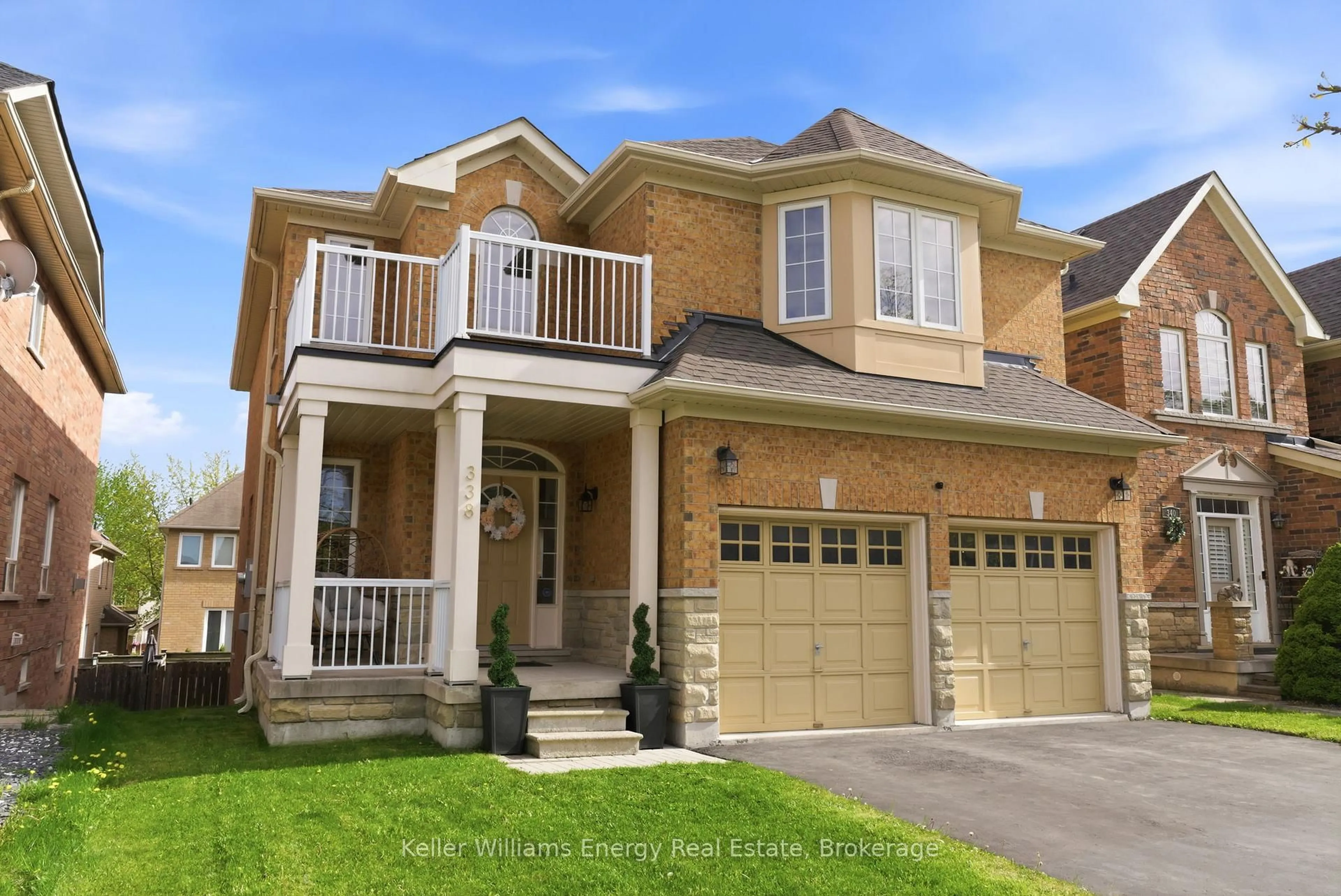 Home with brick exterior material, street for 338 Dowson Loop, Newmarket Ontario L3X 3G3
