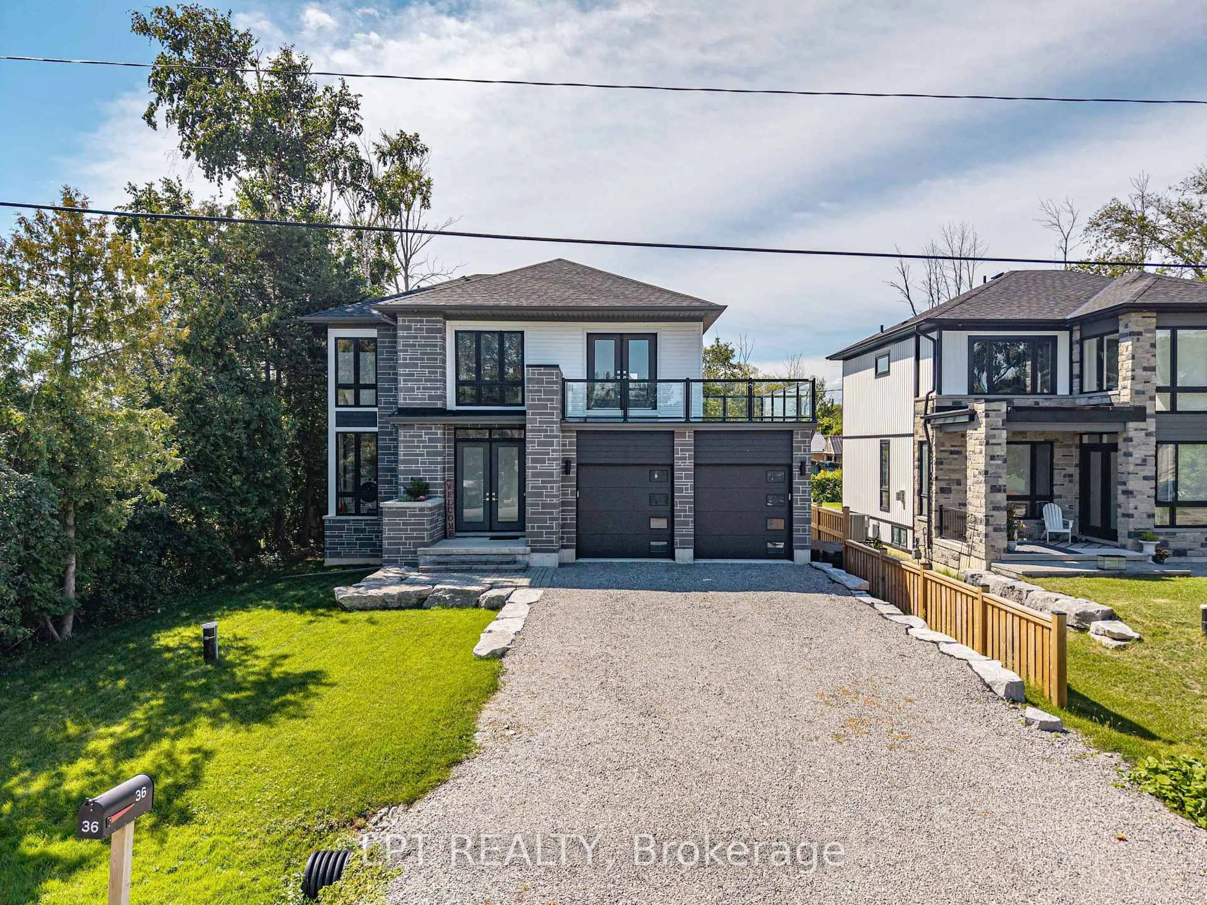 A pic from outside/outdoor area/front of a property/back of a property/a pic from drone, street for 36 Blue Jay Blvd, Georgina Ontario L0E 1N0