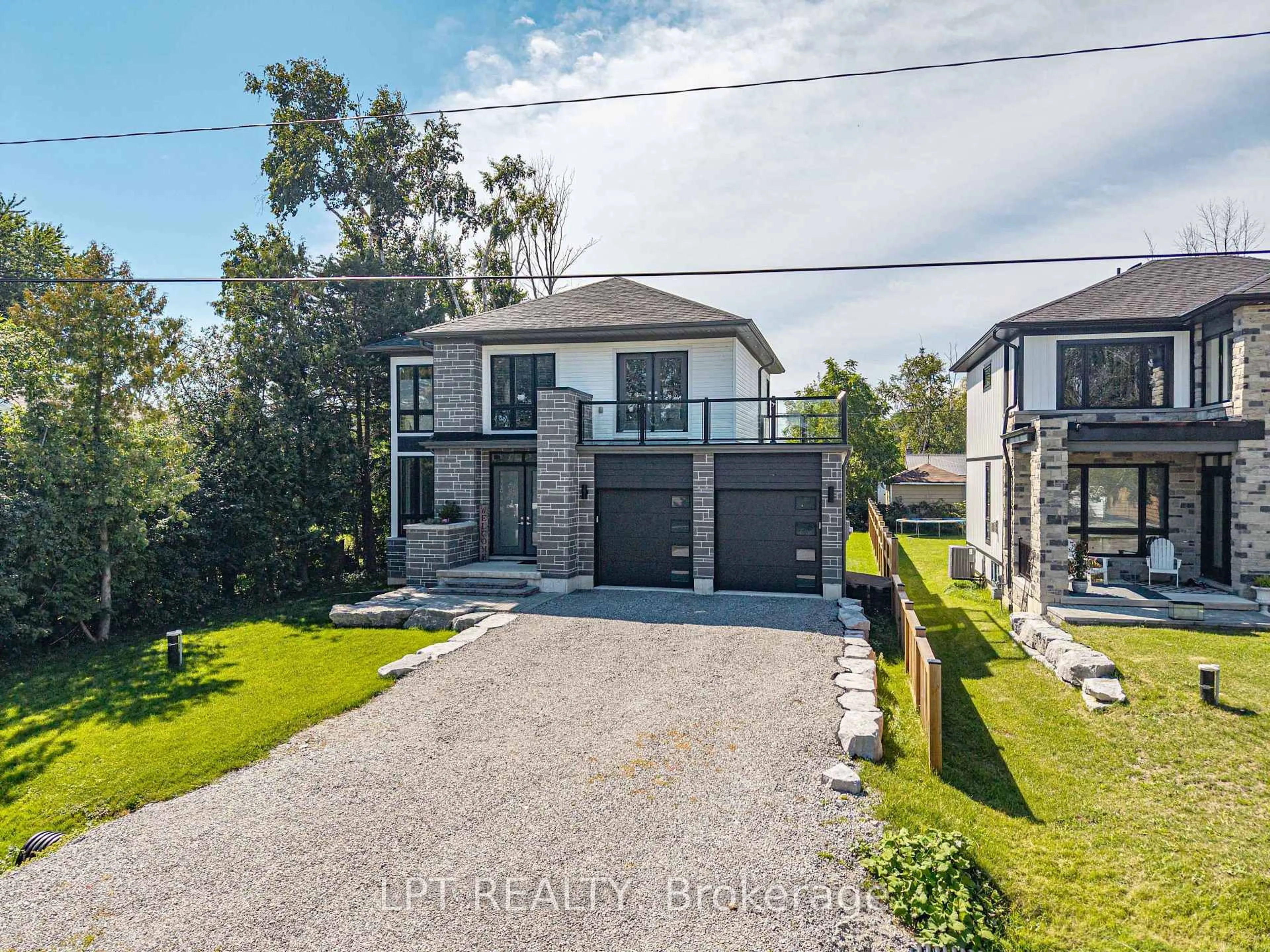 A pic from outside/outdoor area/front of a property/back of a property/a pic from drone, street for 36 Blue Jay Blvd, Georgina Ontario L0E 1N0