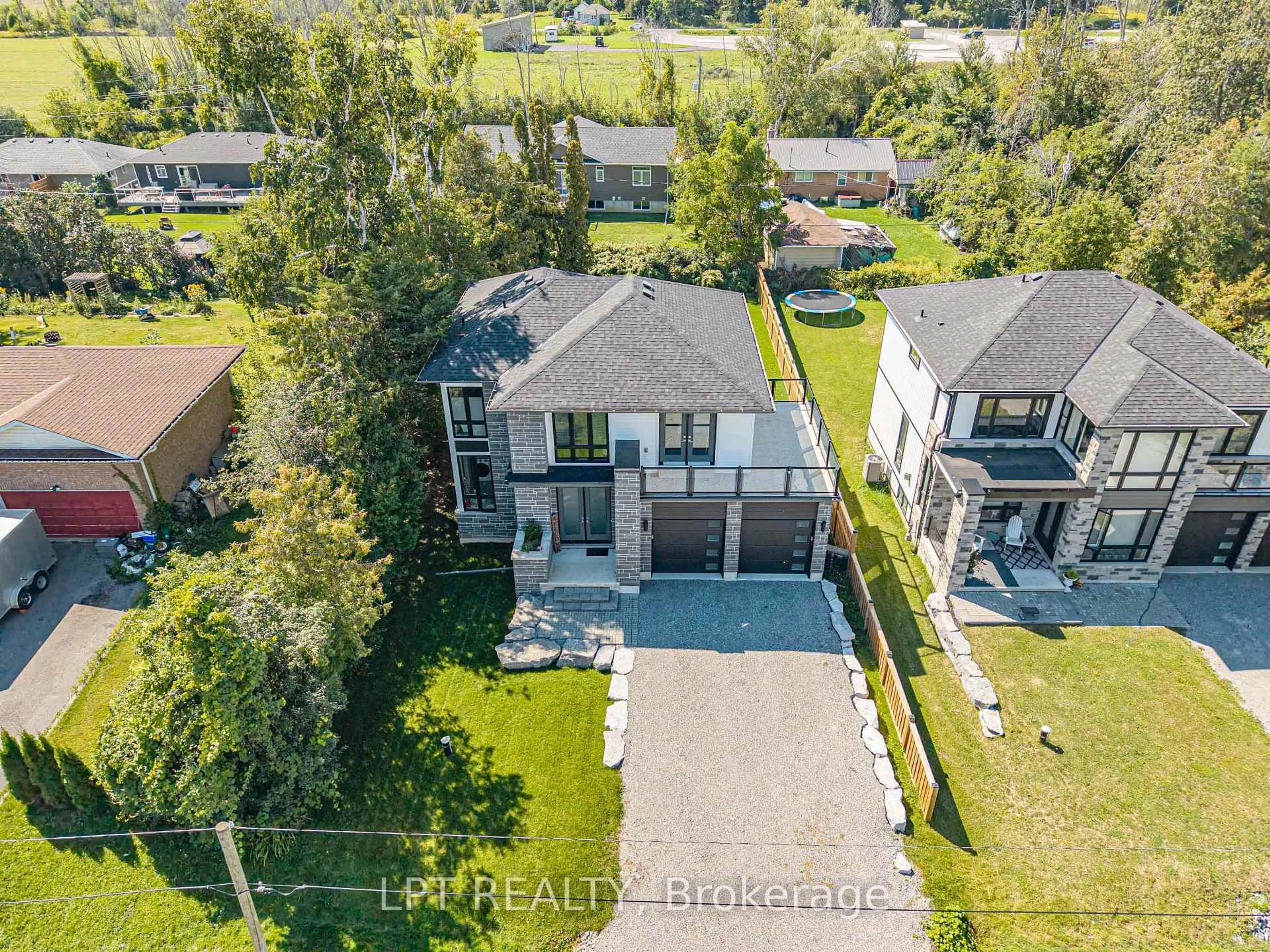 A pic from outside/outdoor area/front of a property/back of a property/a pic from drone, unknown for 36 Blue Jay Blvd, Georgina Ontario L0E 1N0