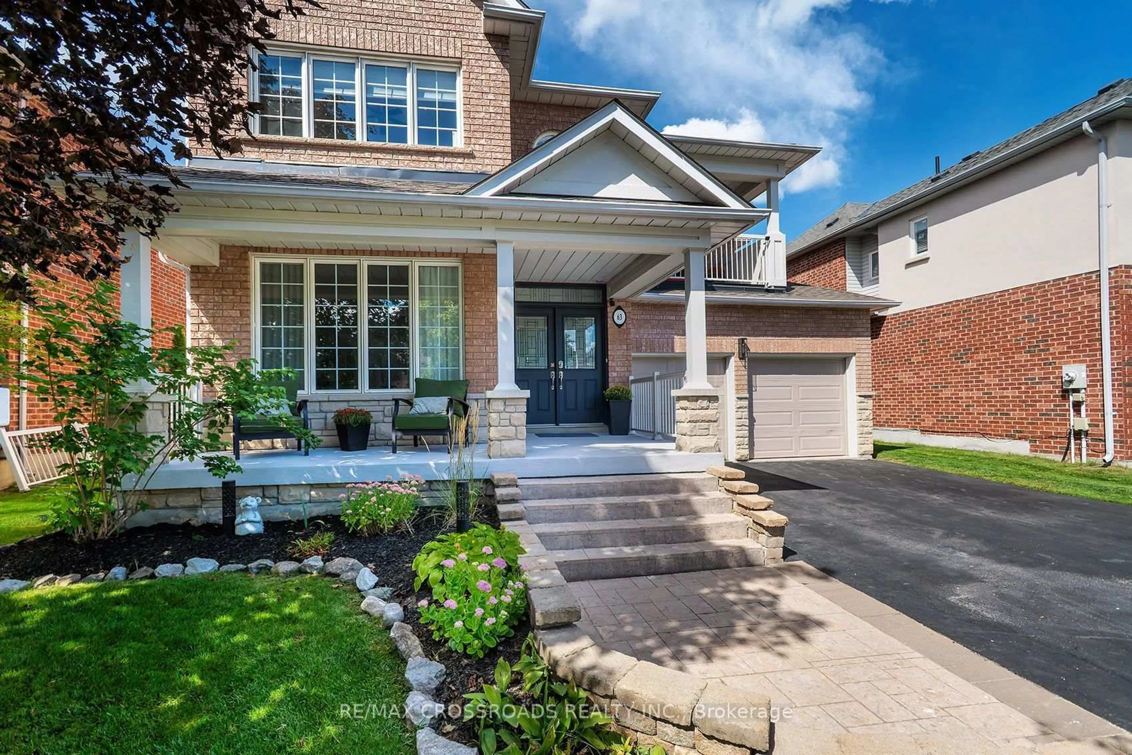 Home with brick exterior material, street for 63 Rosena Lane, Uxbridge Ontario L9P 1X6