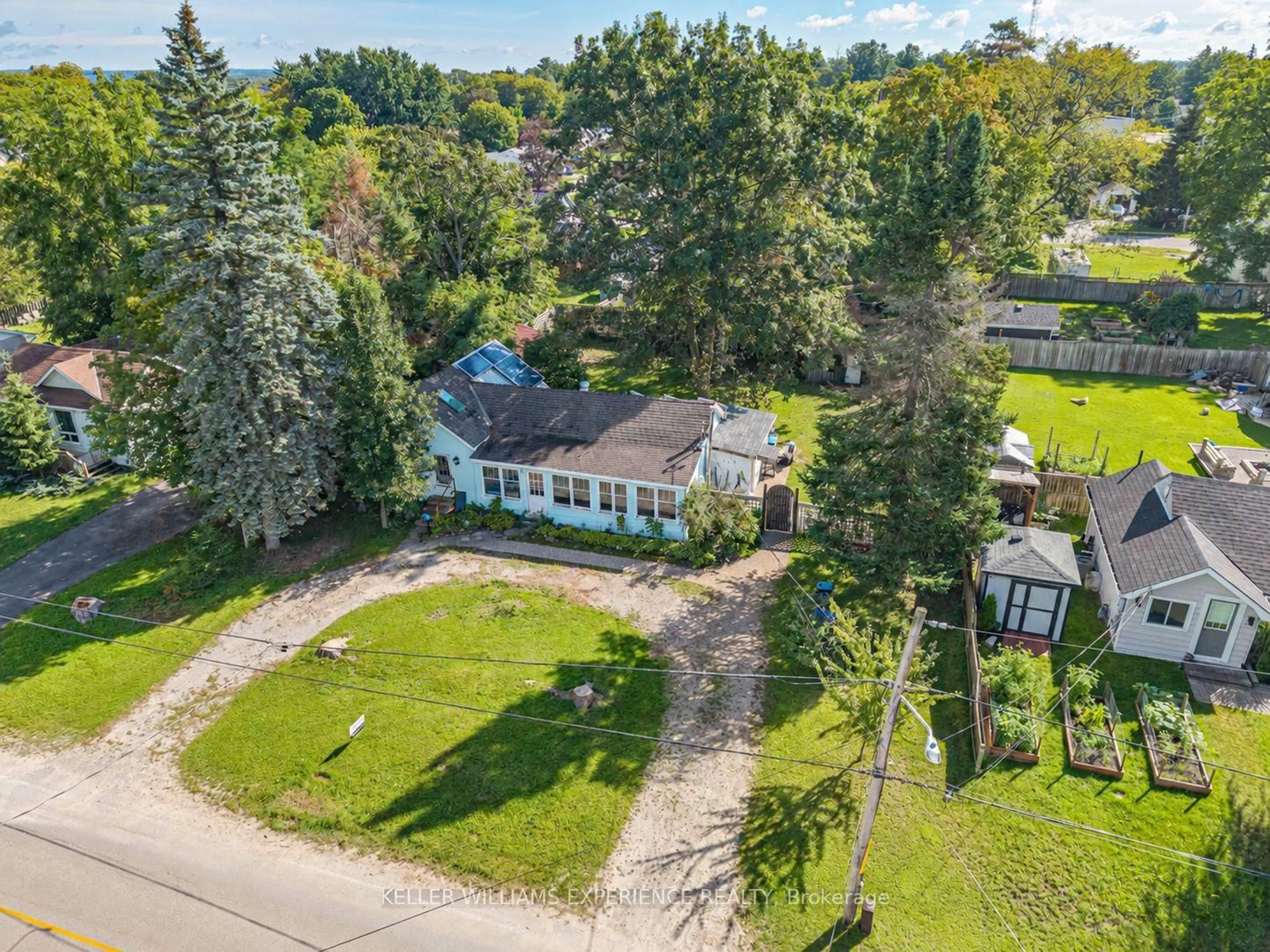 A pic from outside/outdoor area/front of a property/back of a property/a pic from drone, street for 120 Elizabeth St, Essa Ontario L0M 1B0