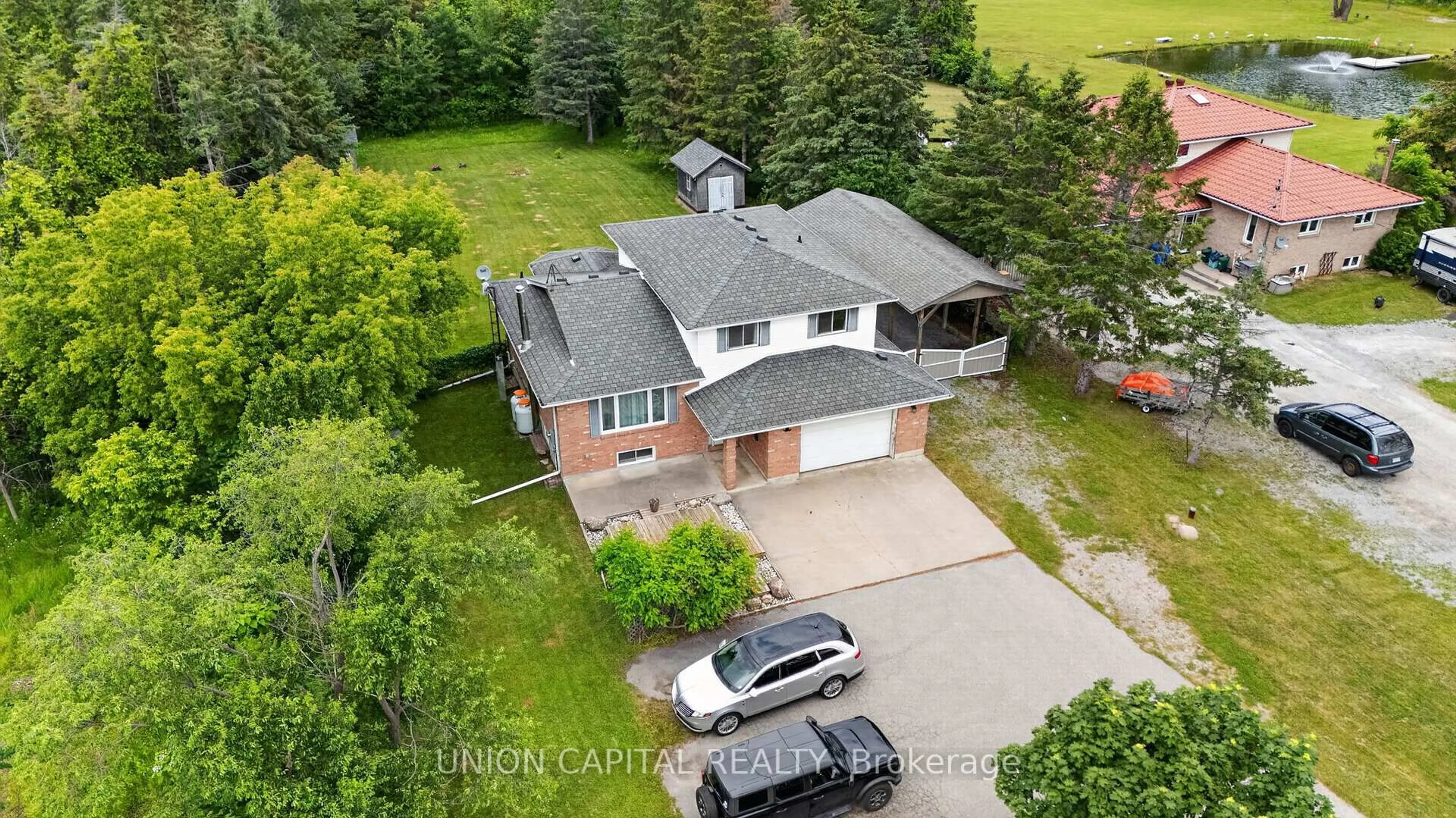A pic from outside/outdoor area/front of a property/back of a property/a pic from drone, street for 3132 Ravenshoe Rd, Georgina Ontario L4P 3E9