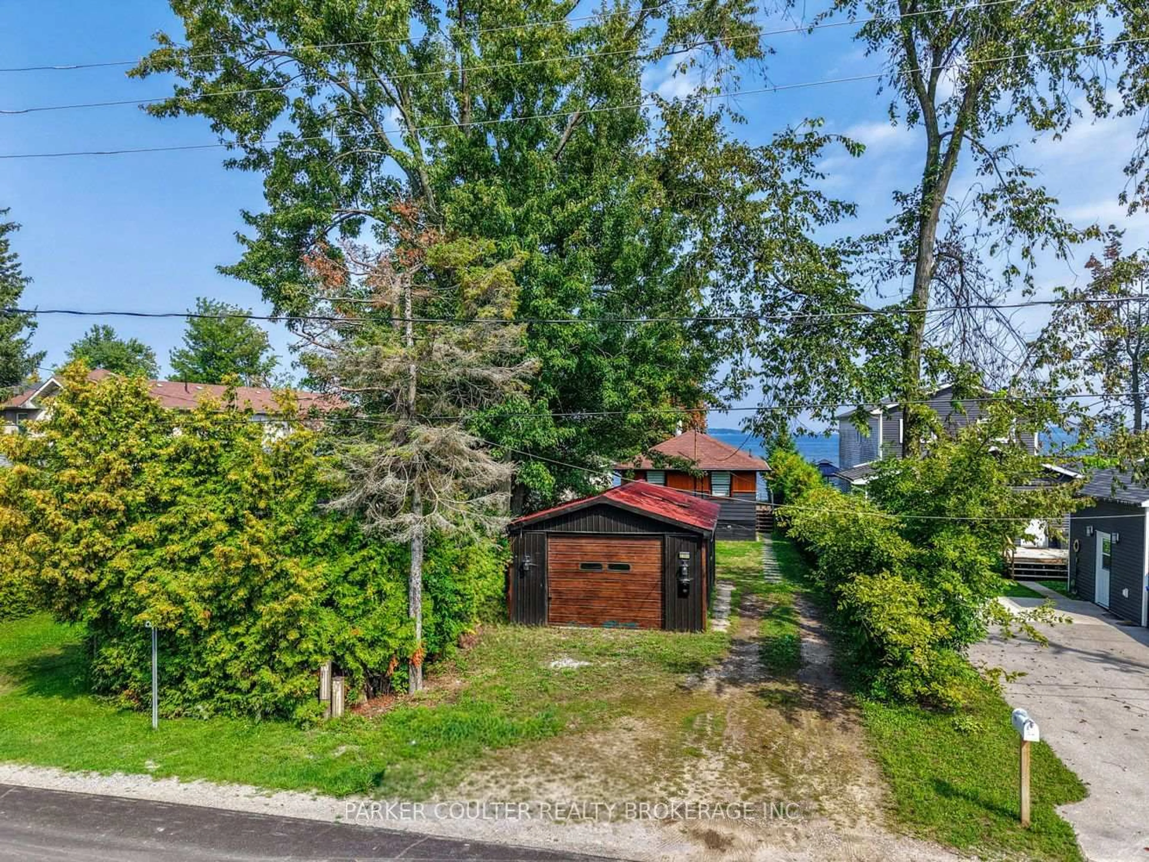 A pic from outside/outdoor area/front of a property/back of a property/a pic from drone, street for 2305 Crystal Beach Rd, Innisfil Ontario L9S 3W8