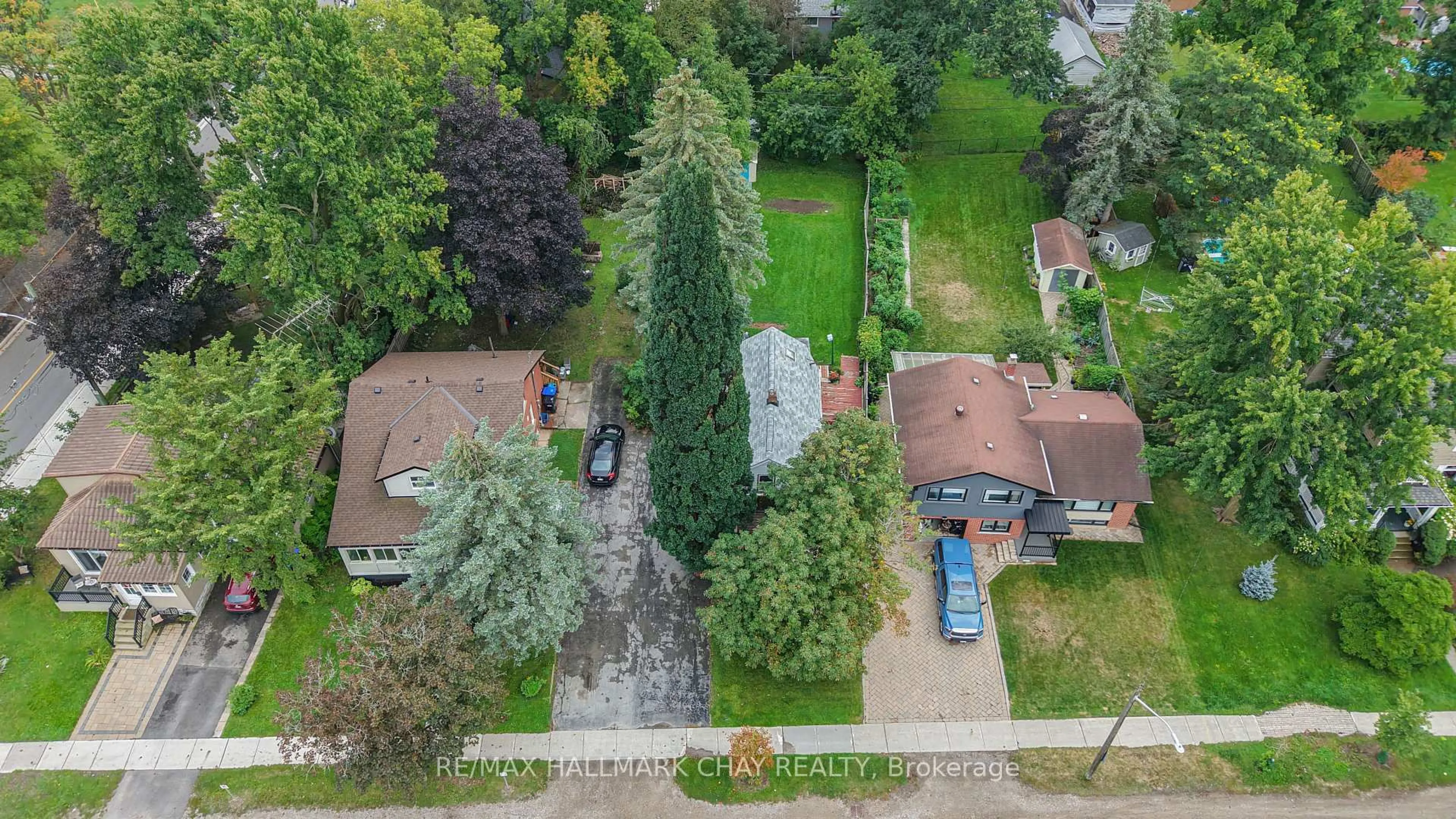 A pic from outside/outdoor area/front of a property/back of a property/a pic from drone, street for 41 Mill St, New Tecumseth Ontario L0G 1W0