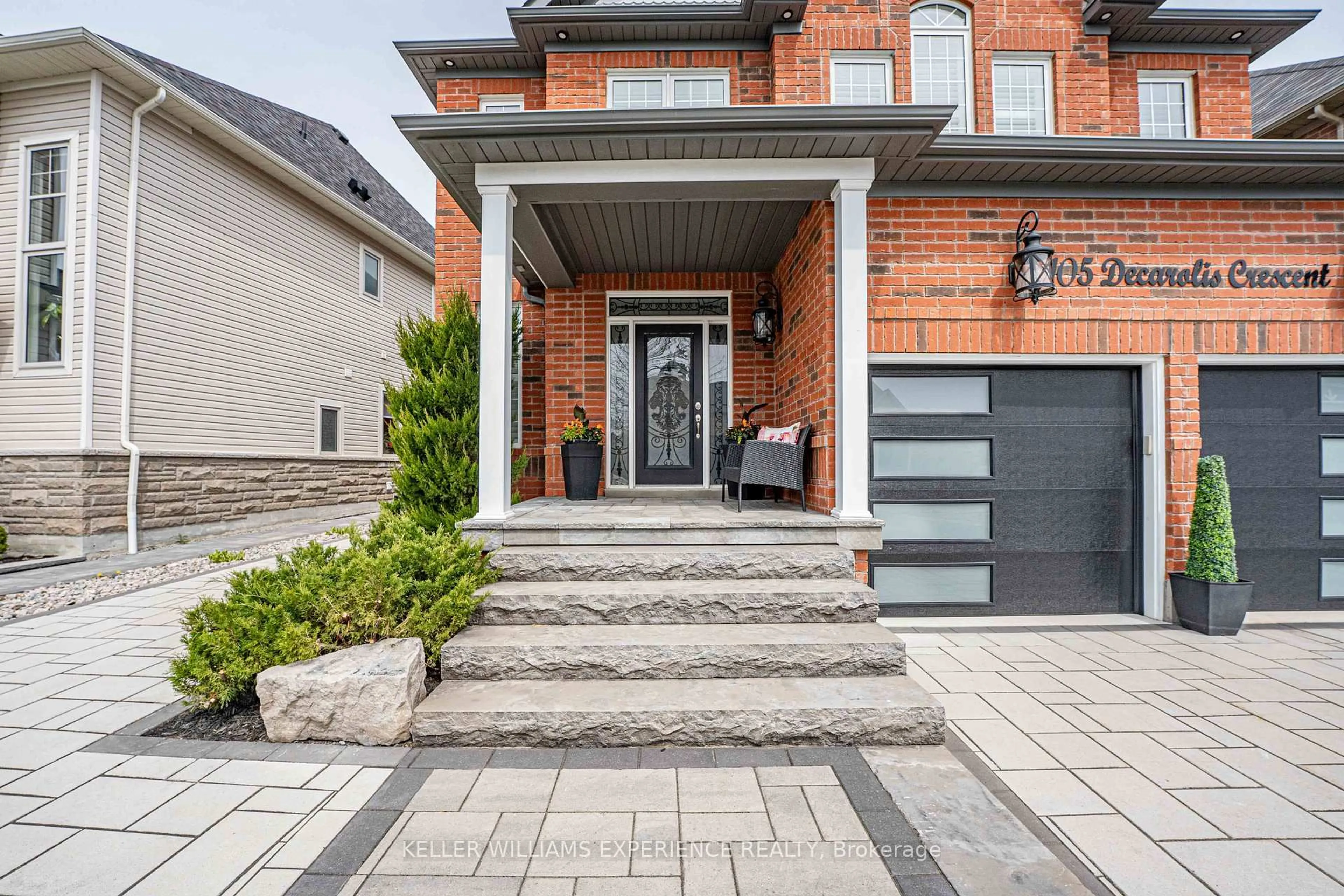 Home with brick exterior material, street for 105 DECAROLIS Cres, Essa Ontario L3W 0B4