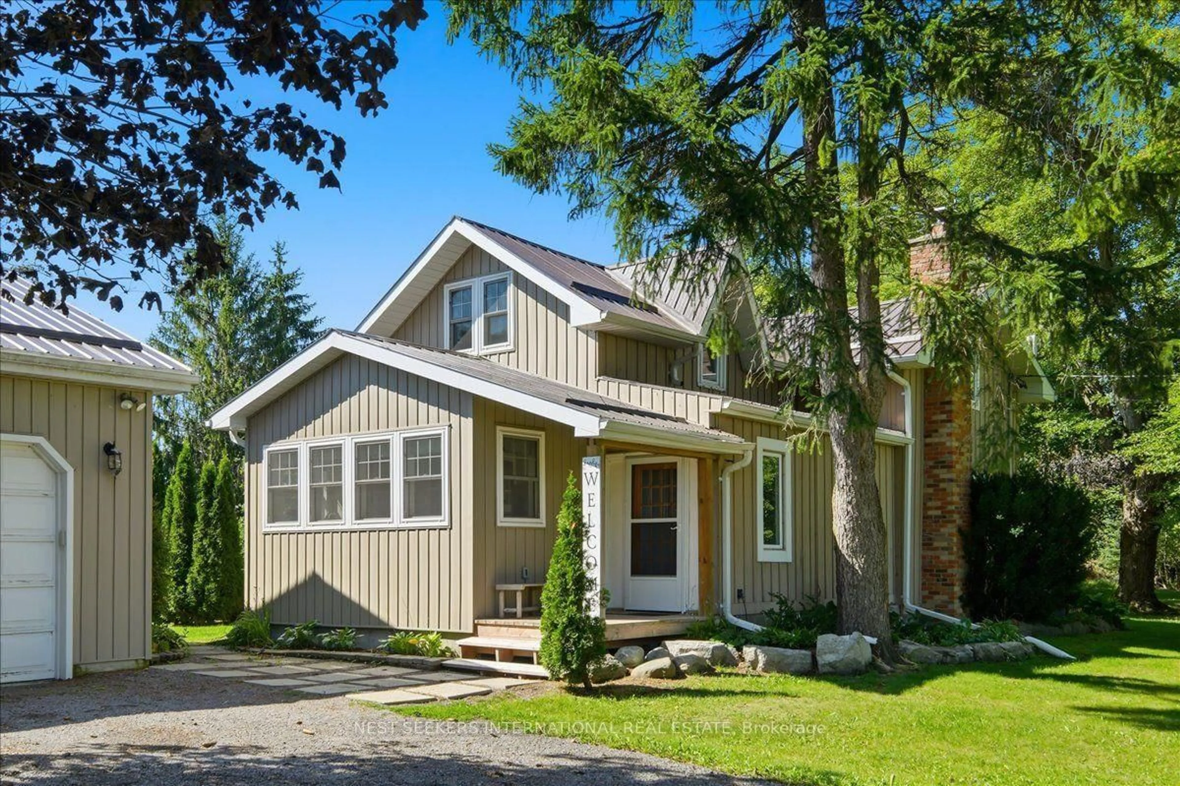 Home with vinyl exterior material, street for 1210 Concession 11 Rd, Brock Ontario L0E 1E0