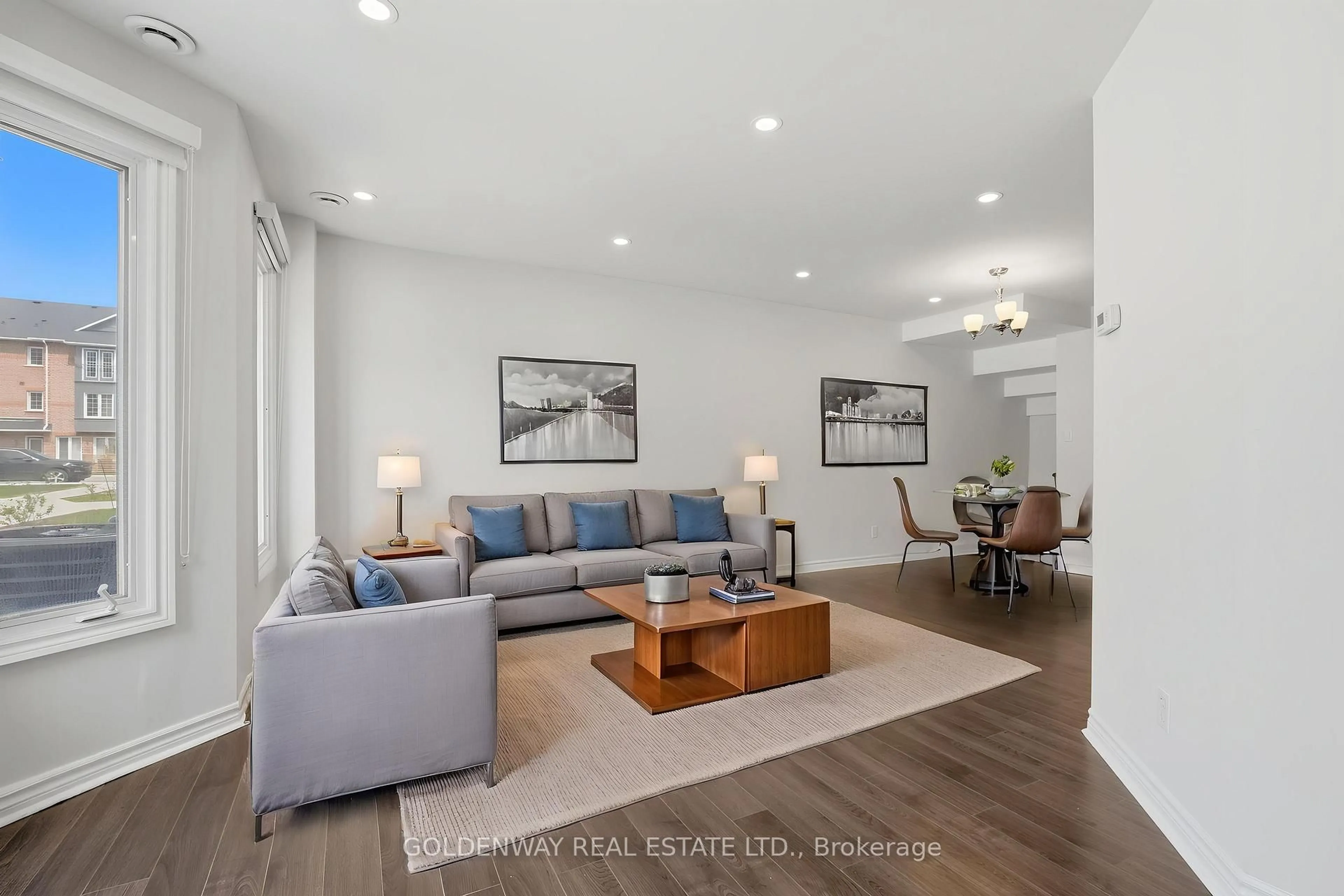 Living room with furniture, wood/laminate floor for 151 Townsgate Dr #63, Vaughan Ontario L4J 8J7