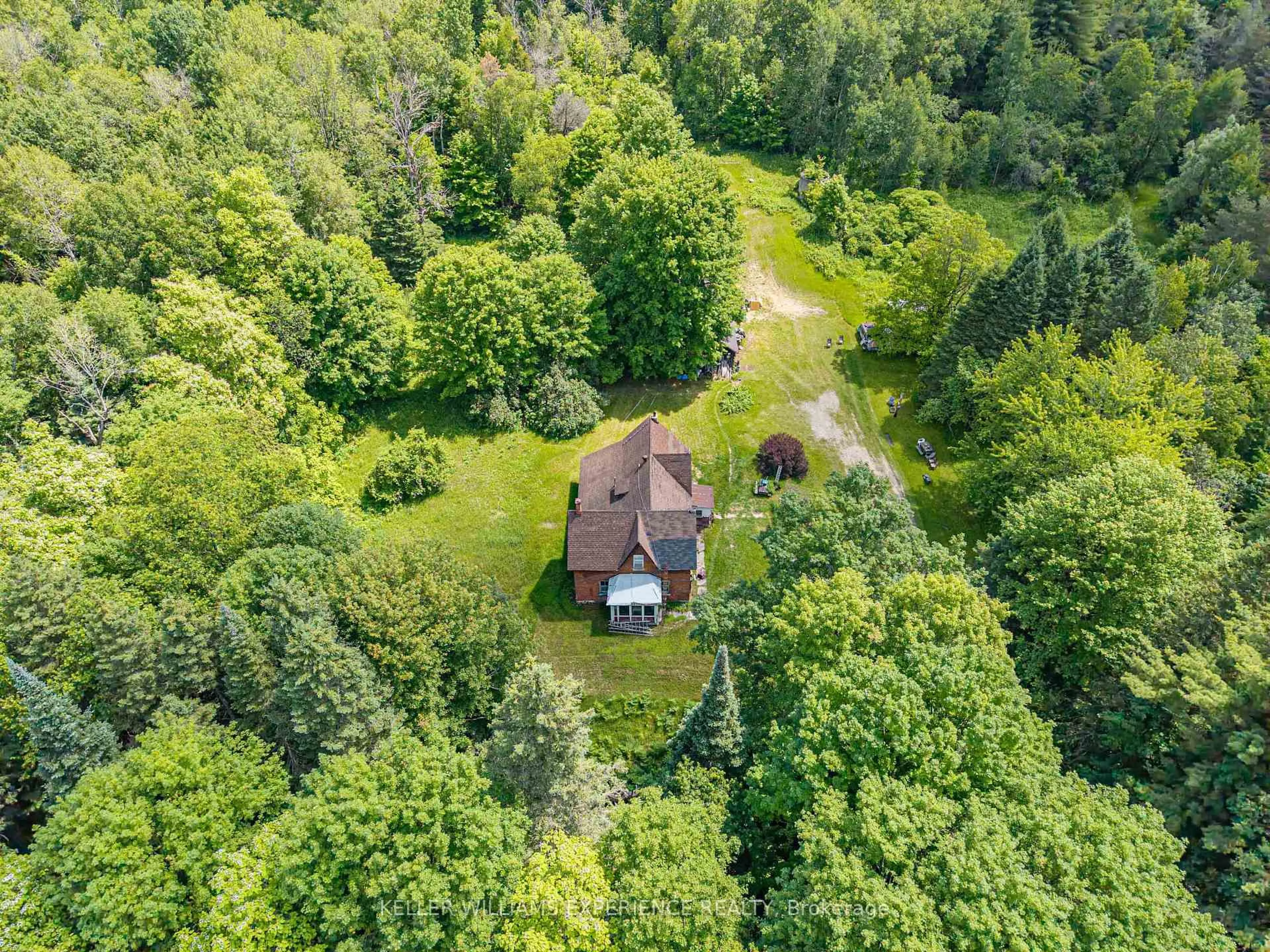 A pic from outside/outdoor area/front of a property/back of a property/a pic from drone, forest/trees view for 8137 4th Line, Essa Ontario L3W 0S5