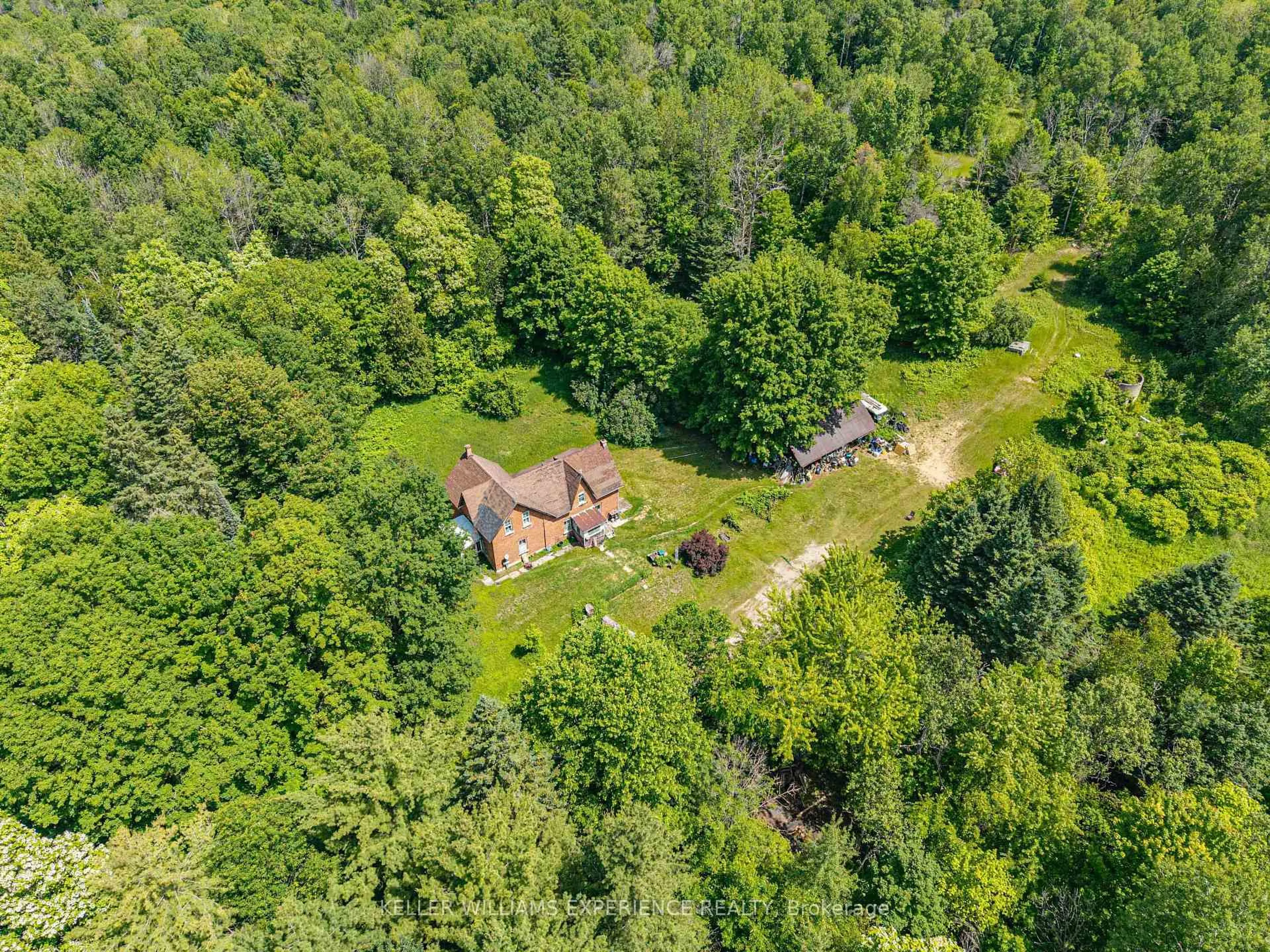 A pic from outside/outdoor area/front of a property/back of a property/a pic from drone, forest/trees view for 8137 4th Line, Essa Ontario L3W 0S5