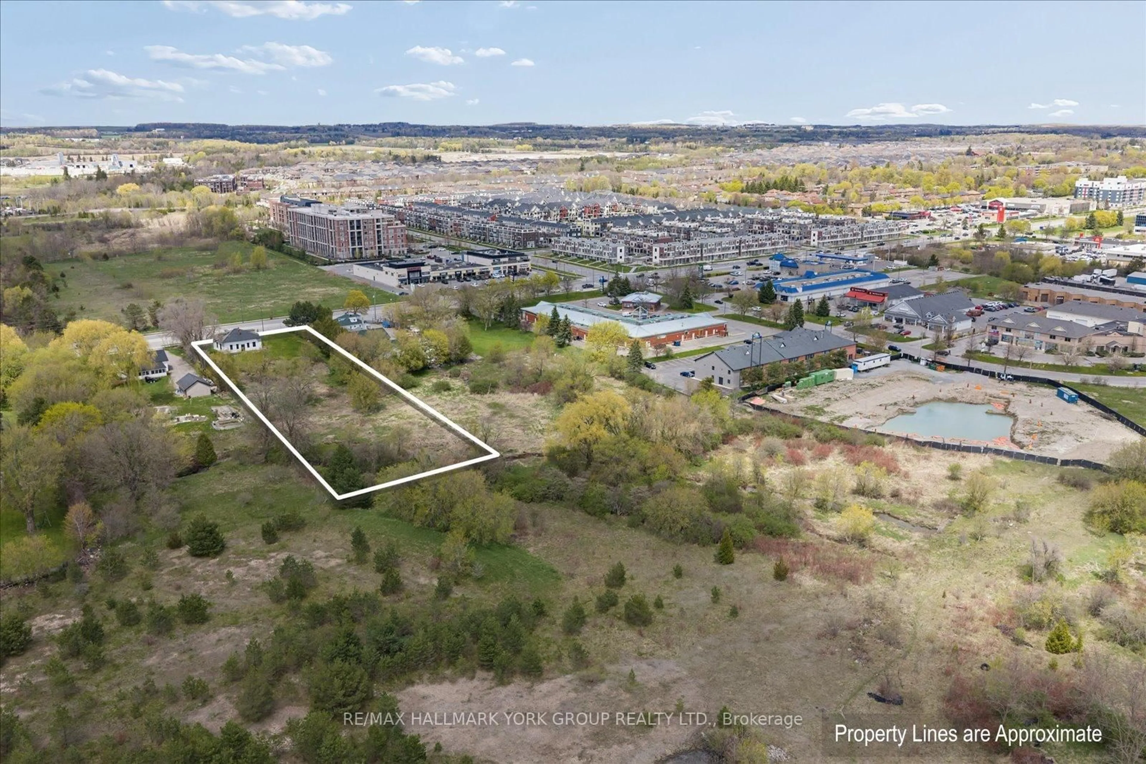 A pic from outside/outdoor area/front of a property/back of a property/a pic from drone, water/lake/river/ocean view for 5387 Main St, Whitchurch-Stouffville Ontario L4A 1H3