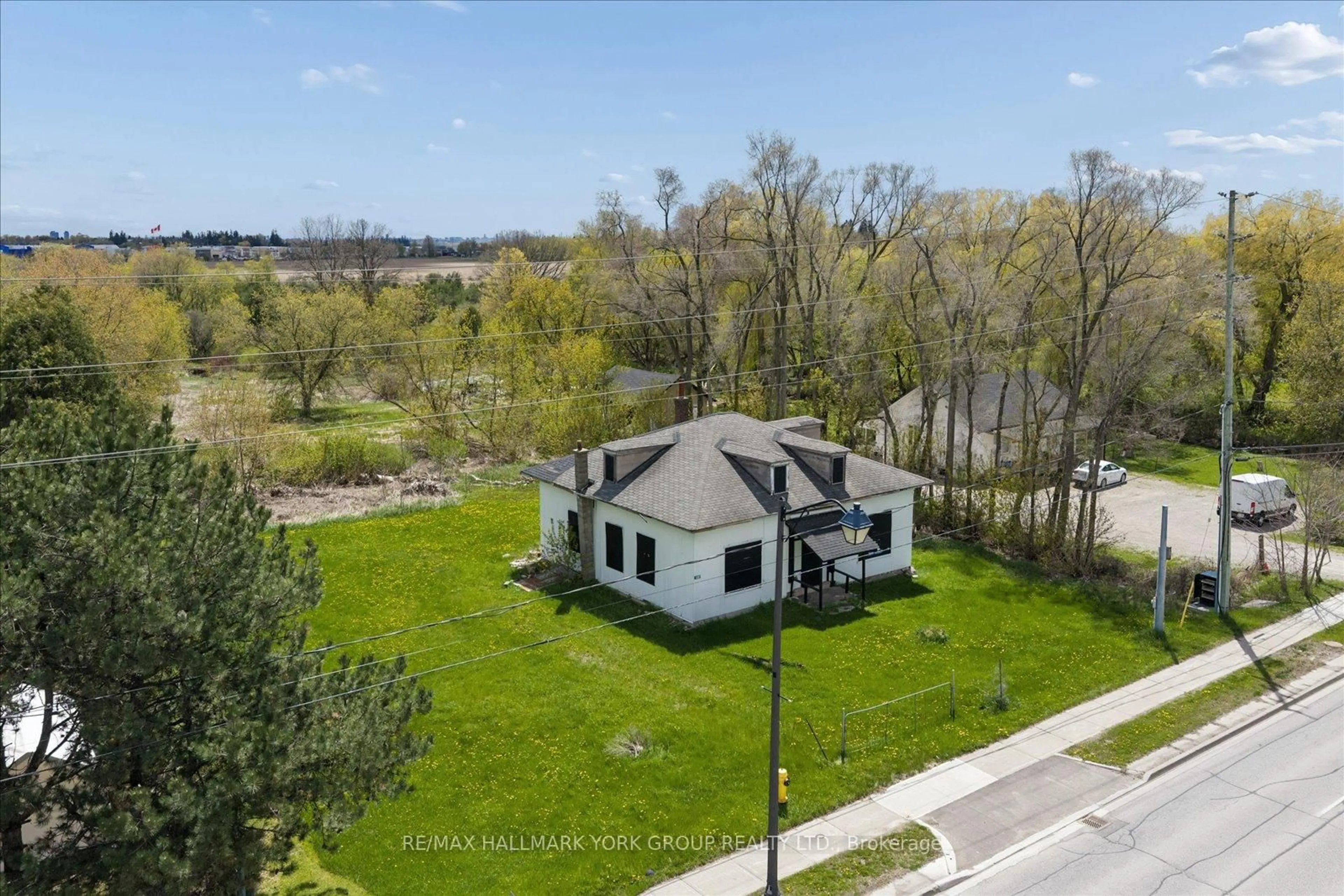 A pic from outside/outdoor area/front of a property/back of a property/a pic from drone, water/lake/river/ocean view for 5387 Main St, Whitchurch-Stouffville Ontario L4A 1H3