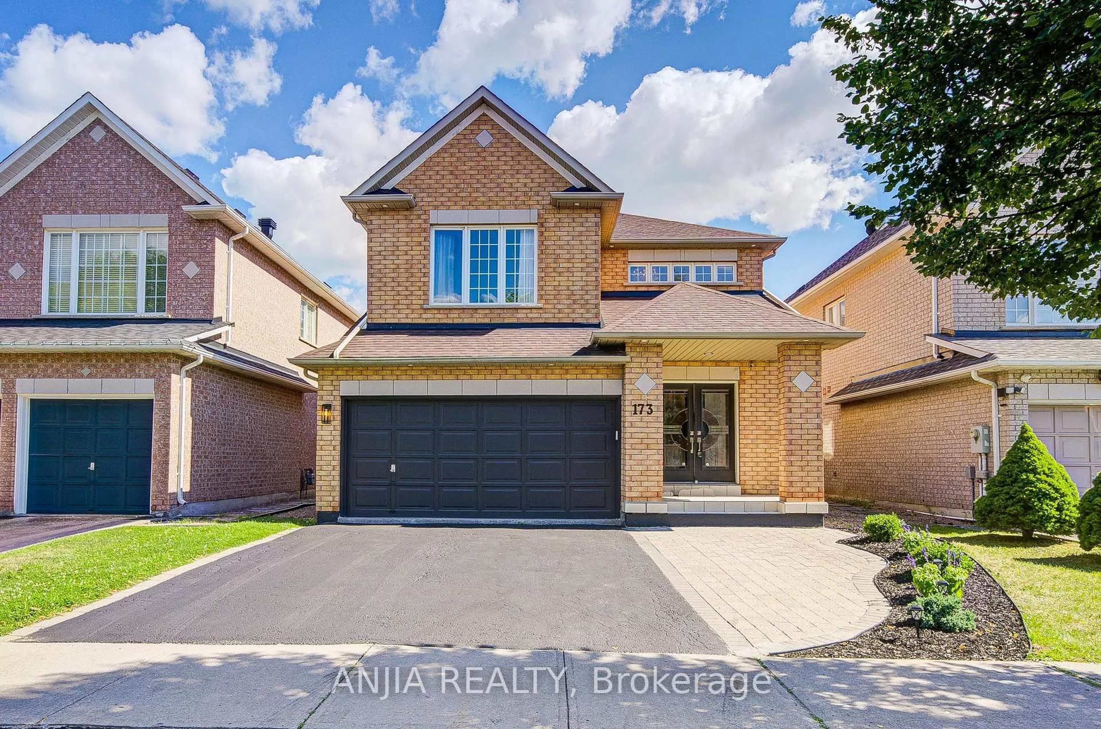 Home with brick exterior material, street for 173 Russell Jarvis Dr, Markham Ontario L3S 4L3