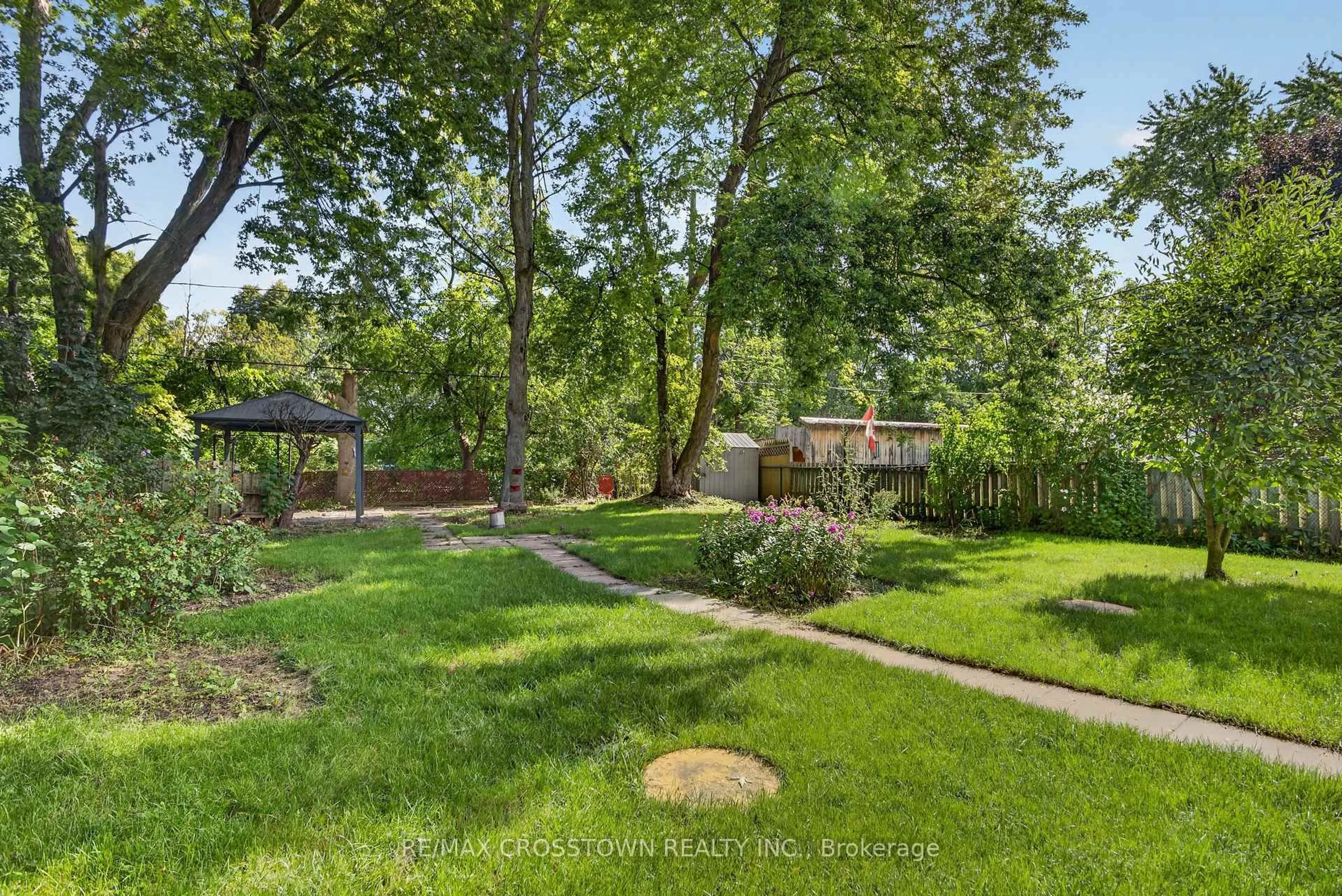 A pic from outside/outdoor area/front of a property/back of a property/a pic from drone, unknown for 63 Adeline Ave, New Tecumseth Ontario L0G 1W0