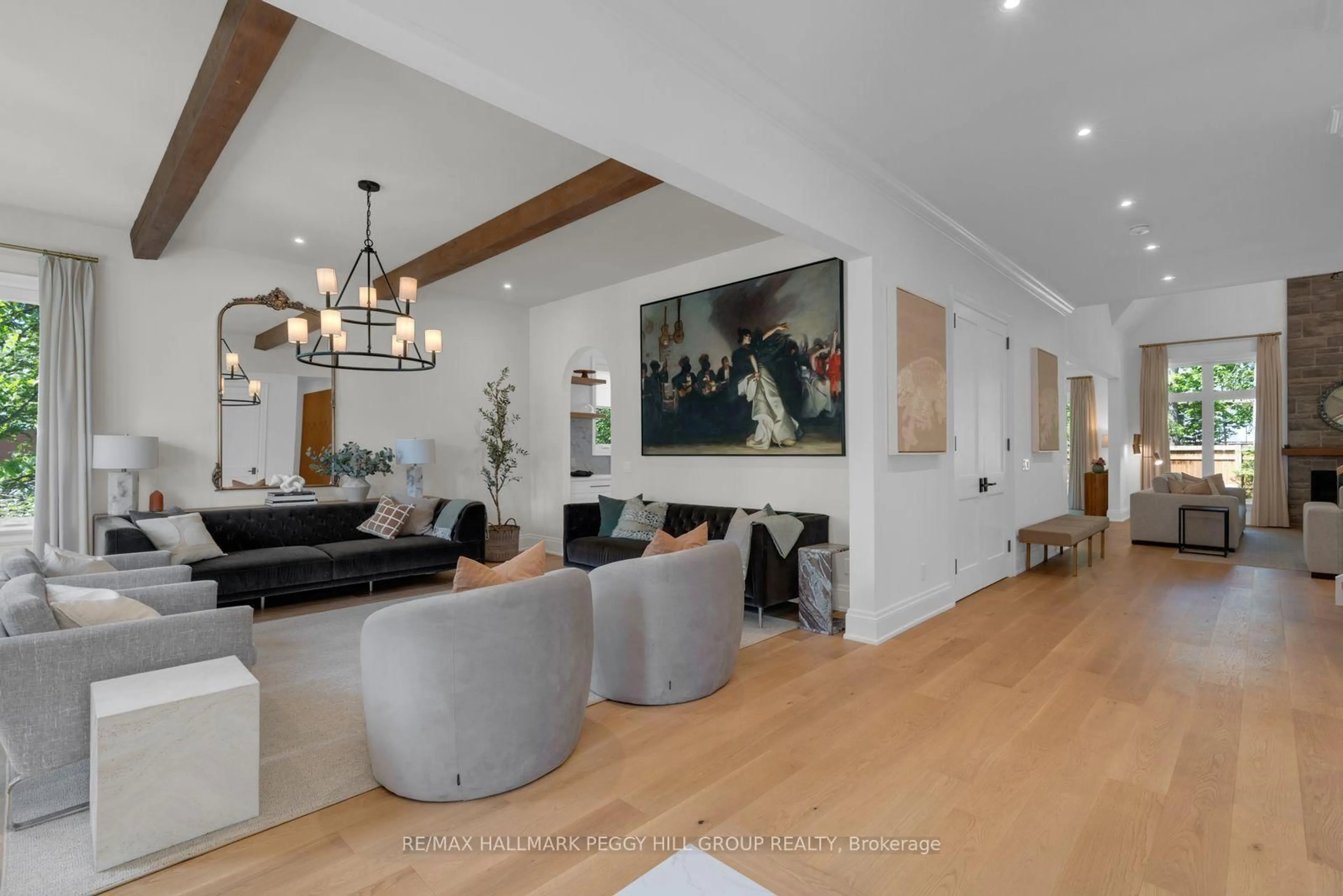 Living room with furniture, wood/laminate floor for 2338 Buchanan St, Innisfil Ontario L9S 3W7