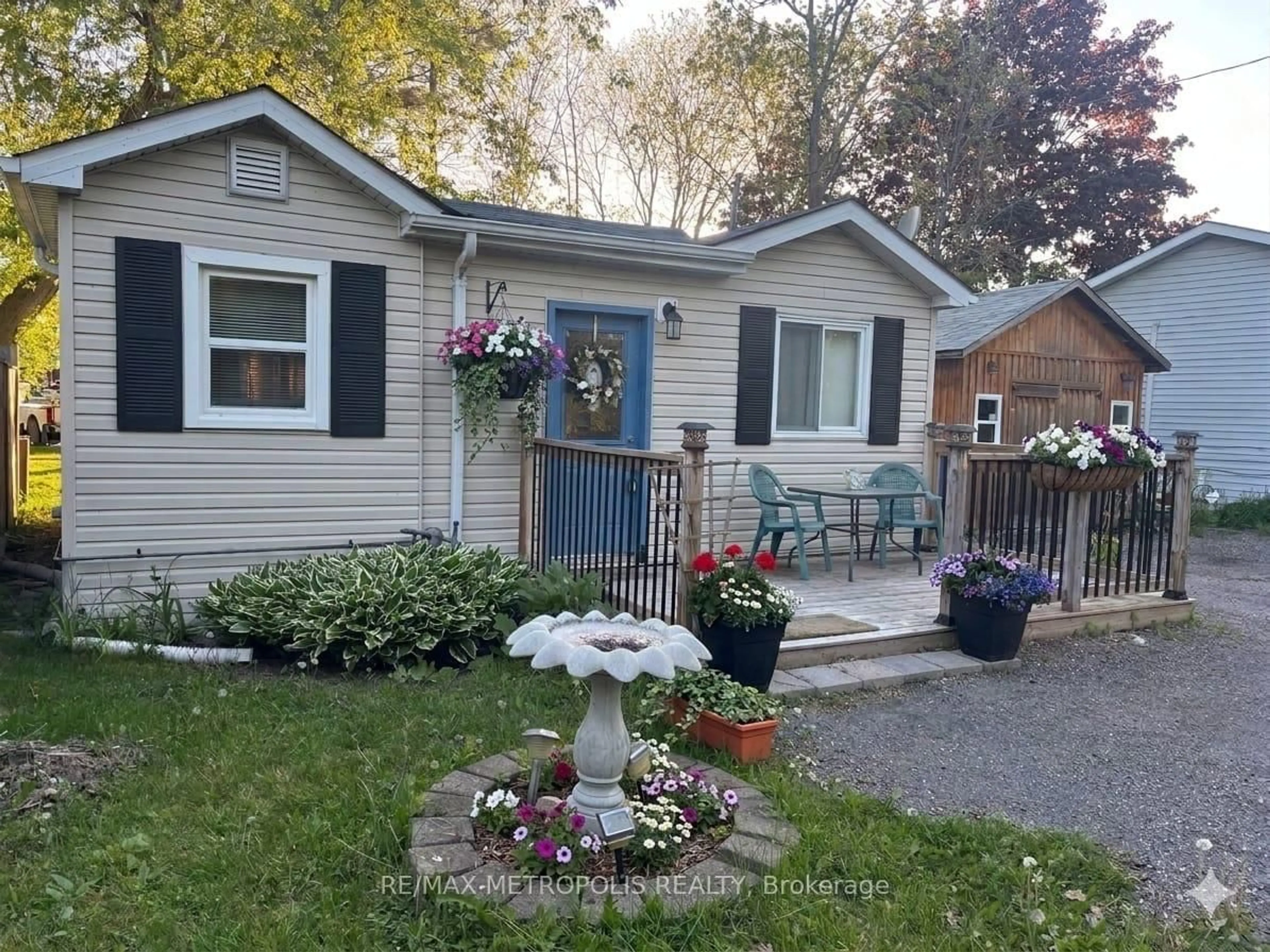Home with vinyl exterior material, street for 28 & 30 Thompson Dr, Georgina Ontario L0E 1L0