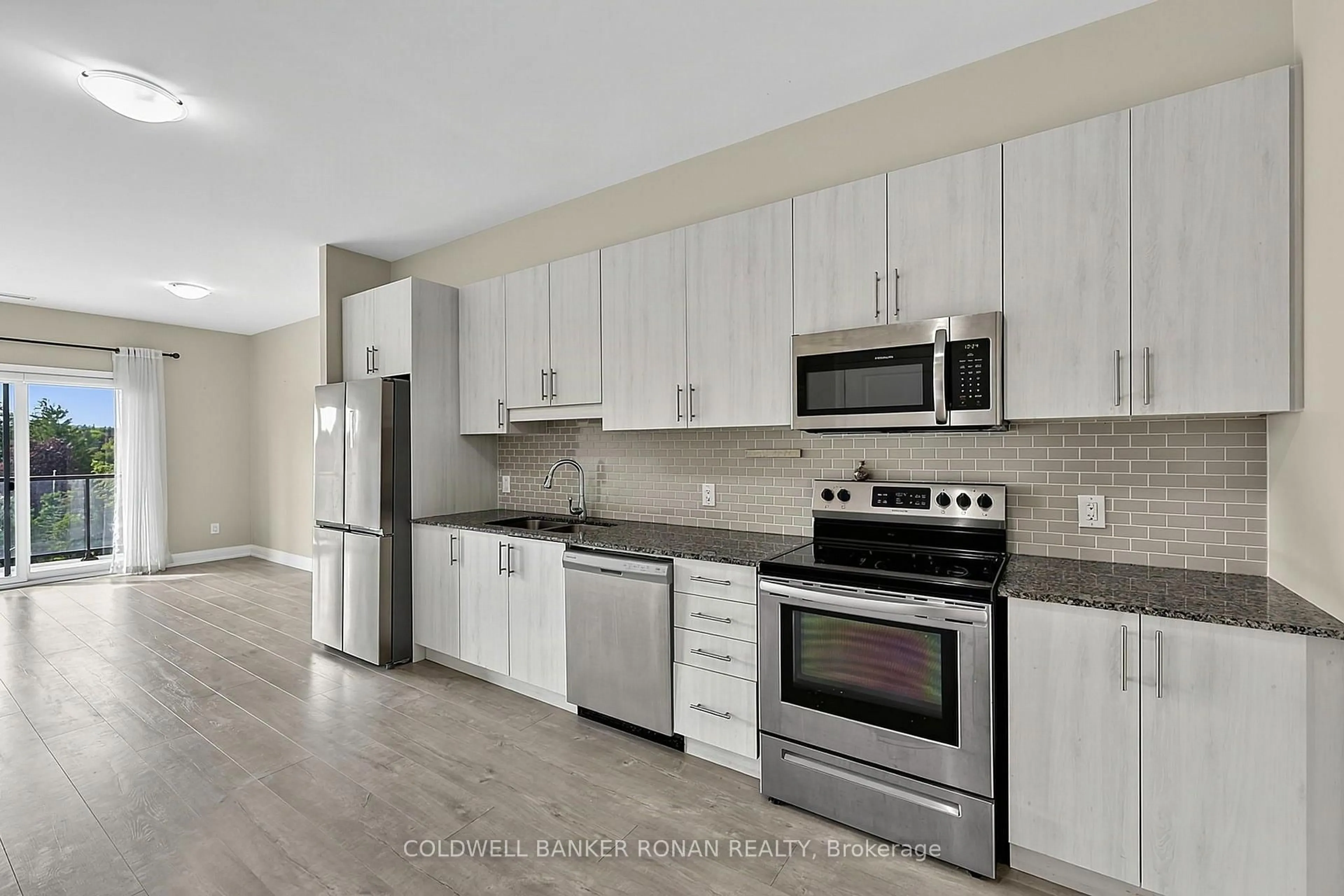 Open concept kitchen, unknown for 64 Queen St #502, New Tecumseth Ontario L0G 1W0