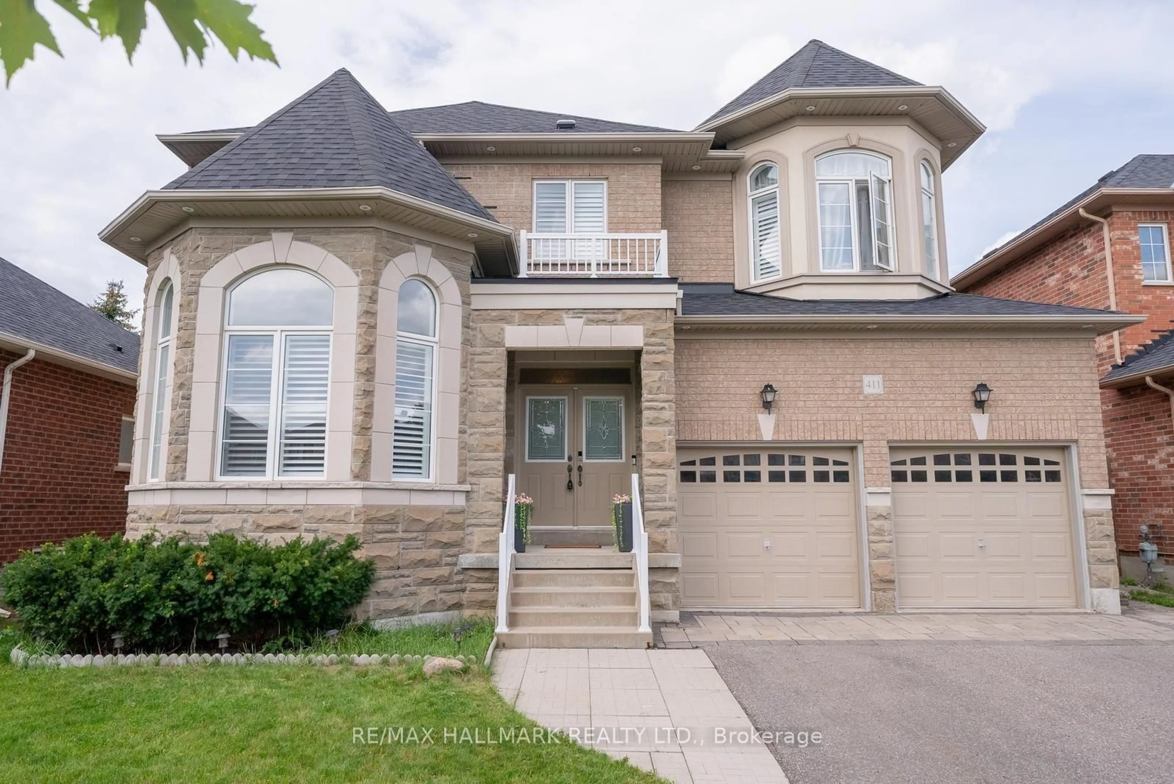 Home with brick exterior material, street for 411 Hoover Park Dr, Whitchurch-Stouffville Ontario L4A 1P4