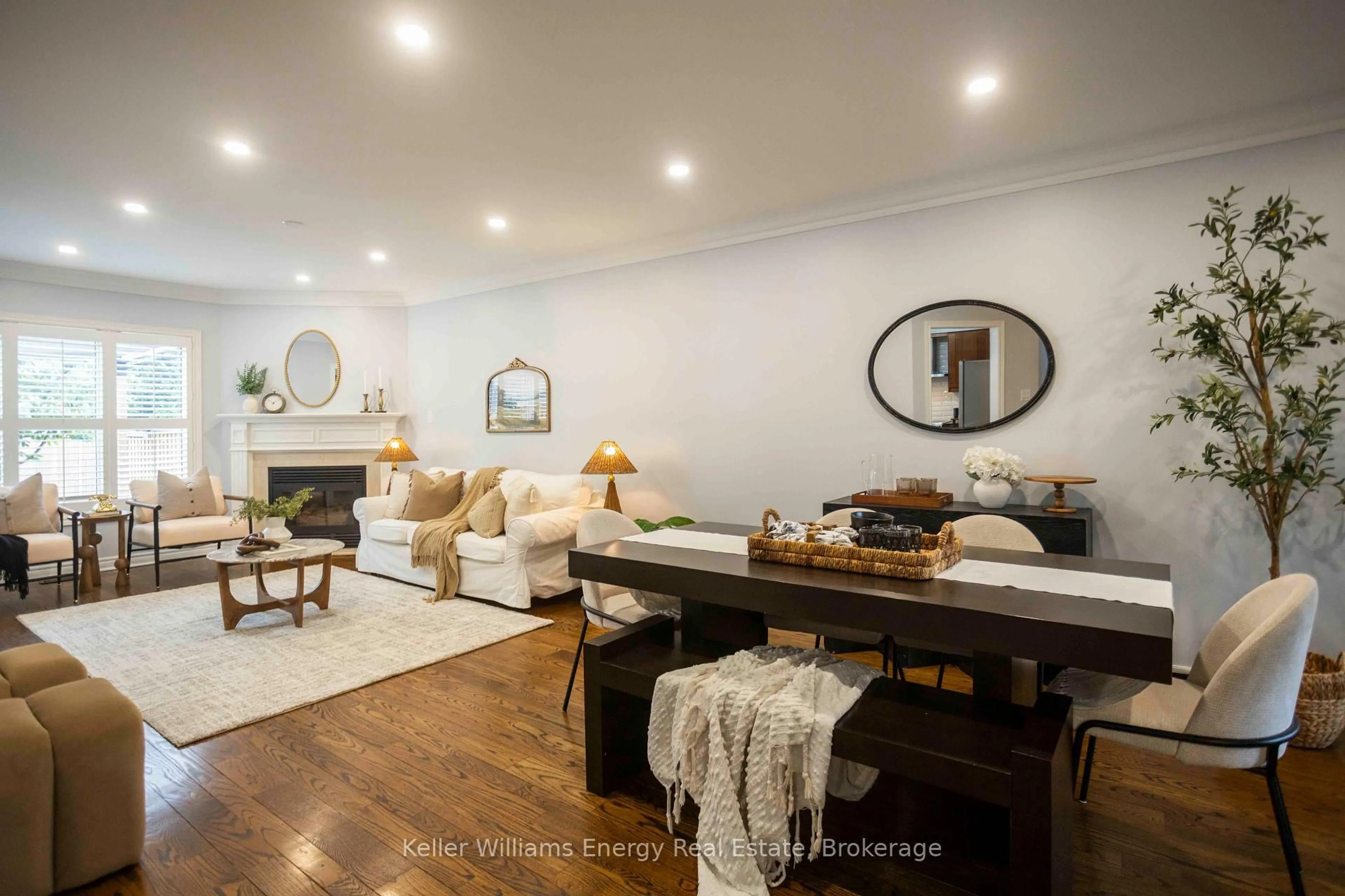 Living room with furniture, wood/laminate floor for 113 Isaac Murray Ave, Vaughan Ontario L6A 2S8