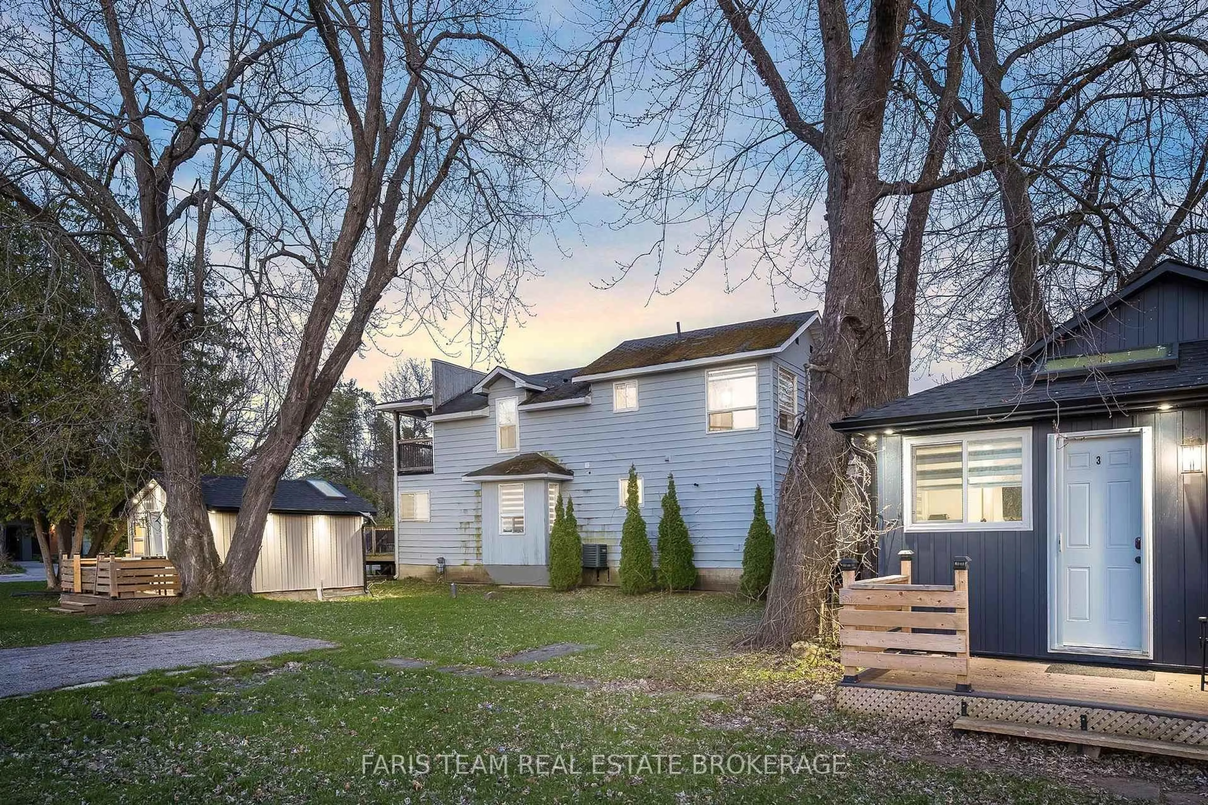 A pic from outside/outdoor area/front of a property/back of a property/a pic from drone, street for 687 Innisfil Beach Road, Innisfil Ontario L0L 2M0