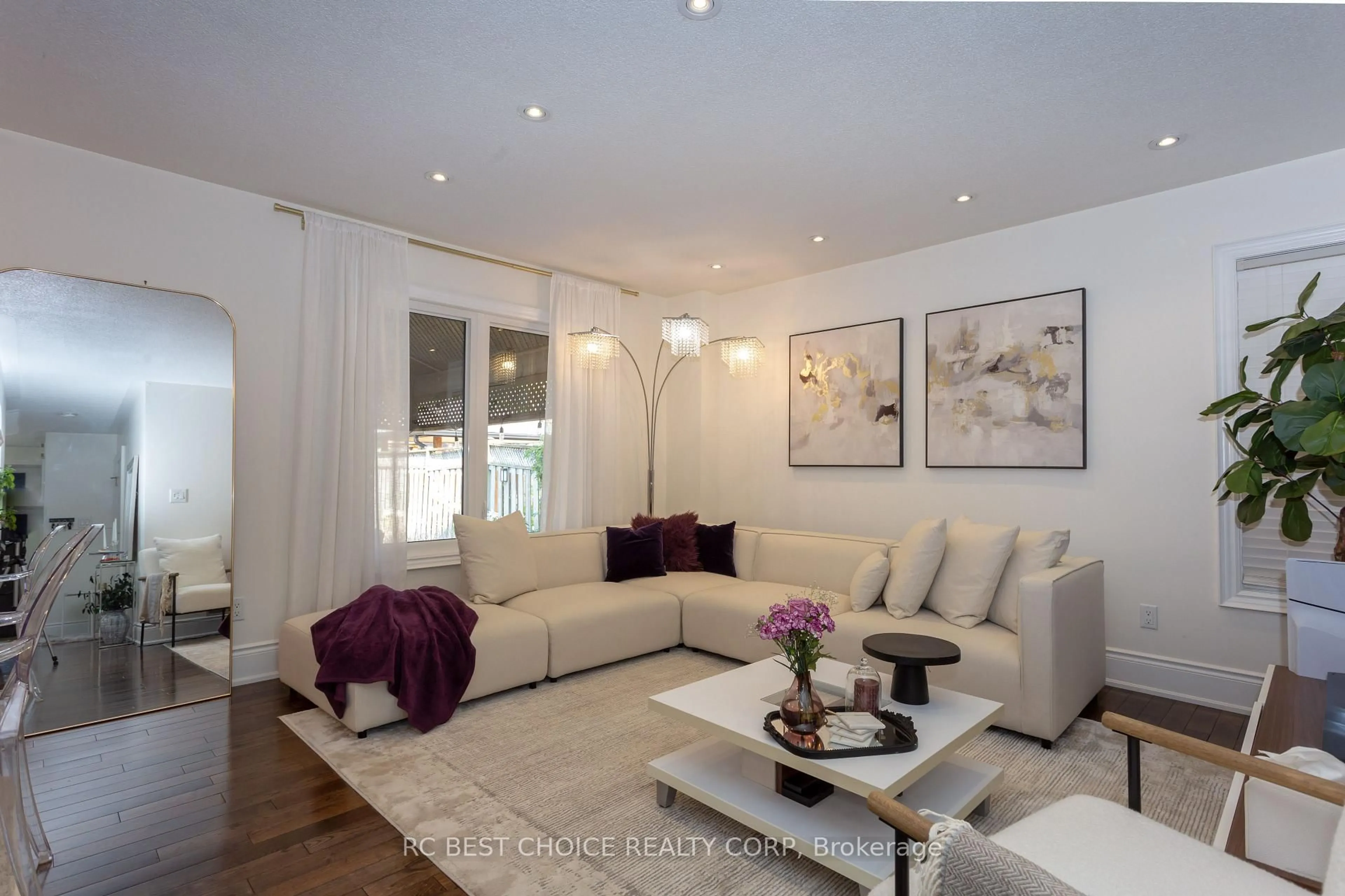 Living room with furniture, wood/laminate floor for 68 Carron Ave, Vaughan Ontario L6A 1Y6