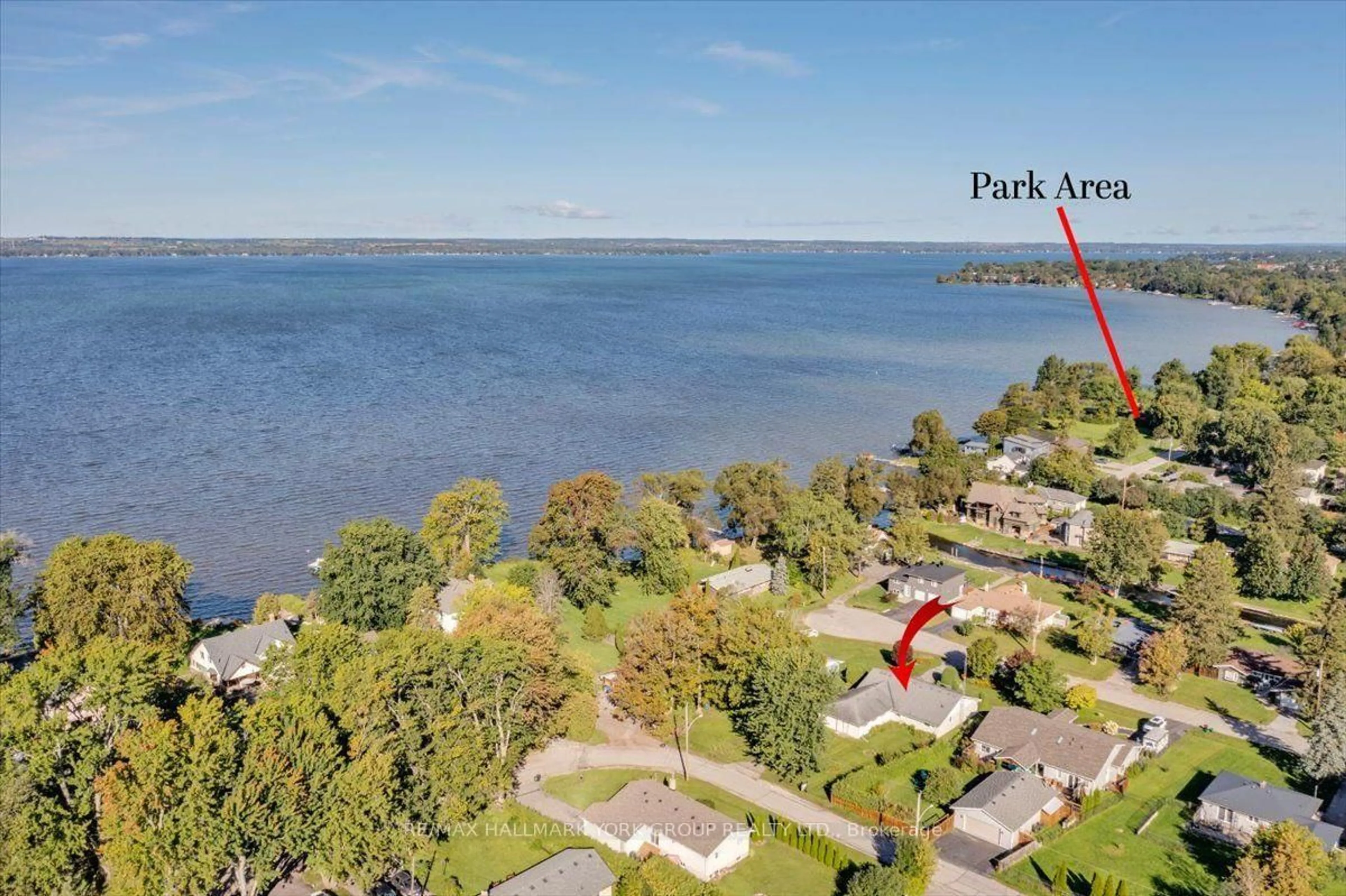 A pic from outside/outdoor area/front of a property/back of a property/a pic from drone, water/lake/river/ocean view for 209 South Channel Dr, Georgina Ontario L4P 2N4